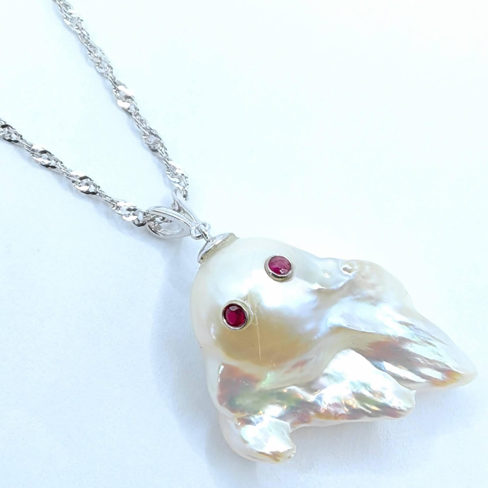 Darling Phantom: Ruby and White Baroque Pearl Ghost Pendant in 18K White Gold In New Condition In Wan Chai District, HK