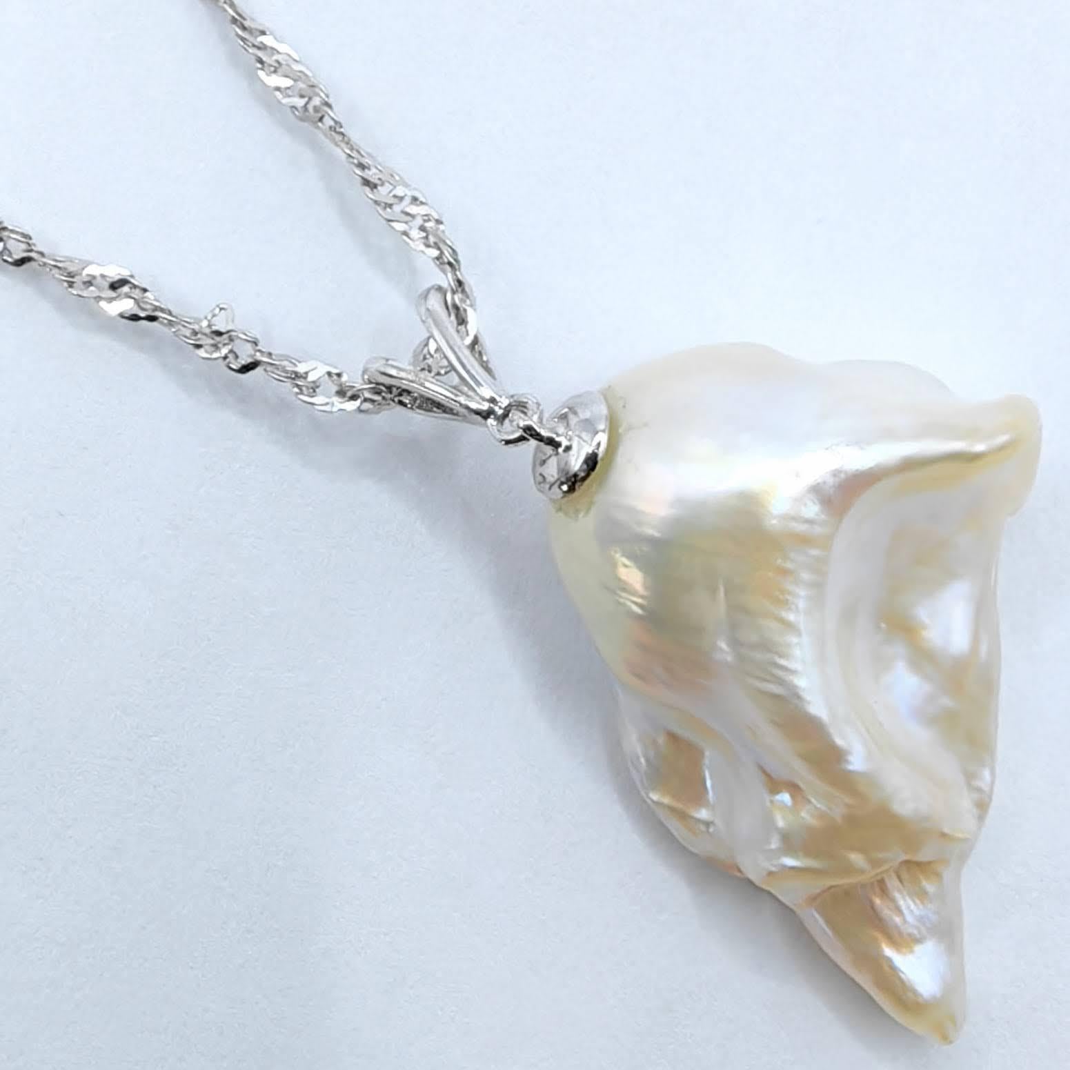 Women's or Men's Darling Phantom: Ruby and White Baroque Pearl Ghost Pendant in 18K White Gold