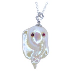 Darling Phantom: Ruby and White Baroque Pearl Ghost Pendant in 18K White Gold