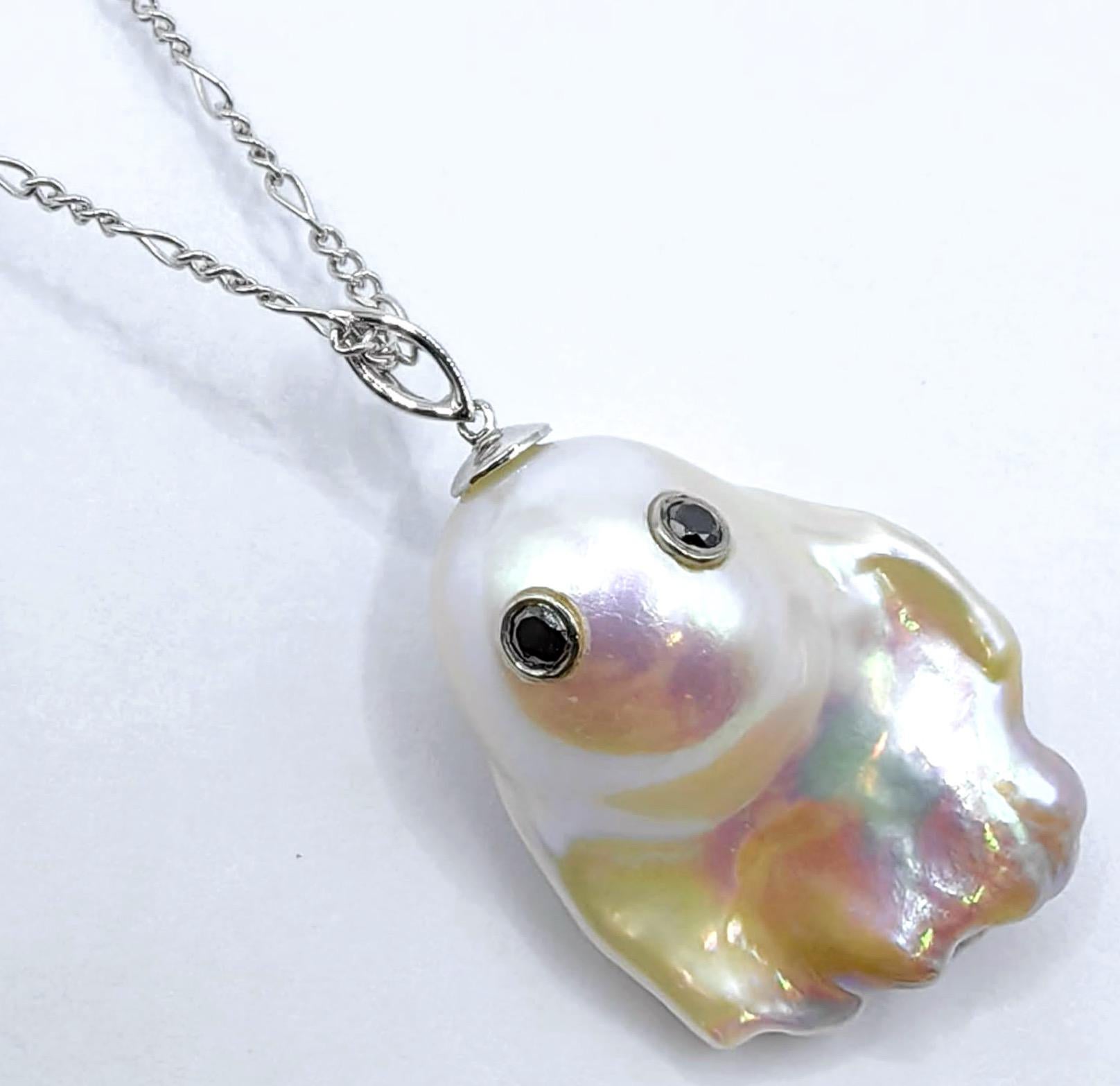 Unveil the enchanting Darling Phantom XL: Black Diamond Baroque Pearl Pendant 18K White Gold, evoking the spirit of a mischievous yet charming ghost. This Freshwater Cultured White Baroque Pearl, weighing an impressive 30.93 carats, is a testament