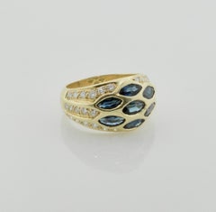 Darling Sapphire and Diamond Ring in 18 Karat Signed "Riviere & Cie."