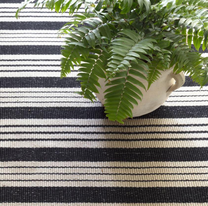 The Birmingham Handwoven Rug is a hand-loomed flatweave in soft 100% cotton. This rug is lightweight and reversible. The classic stripes will blend beautifully into both traditional and modern spaces. Can be used in high- and low-traffic spaces like