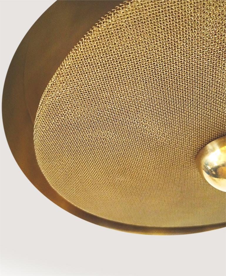 Solid brass spun shade installed over solid brass plate covered with brass mesh. 
Finished and assembled by hand. Original brass assembling technique developed by Candas Design artisans.
Can also be made as flush or semi flush mount.

Although