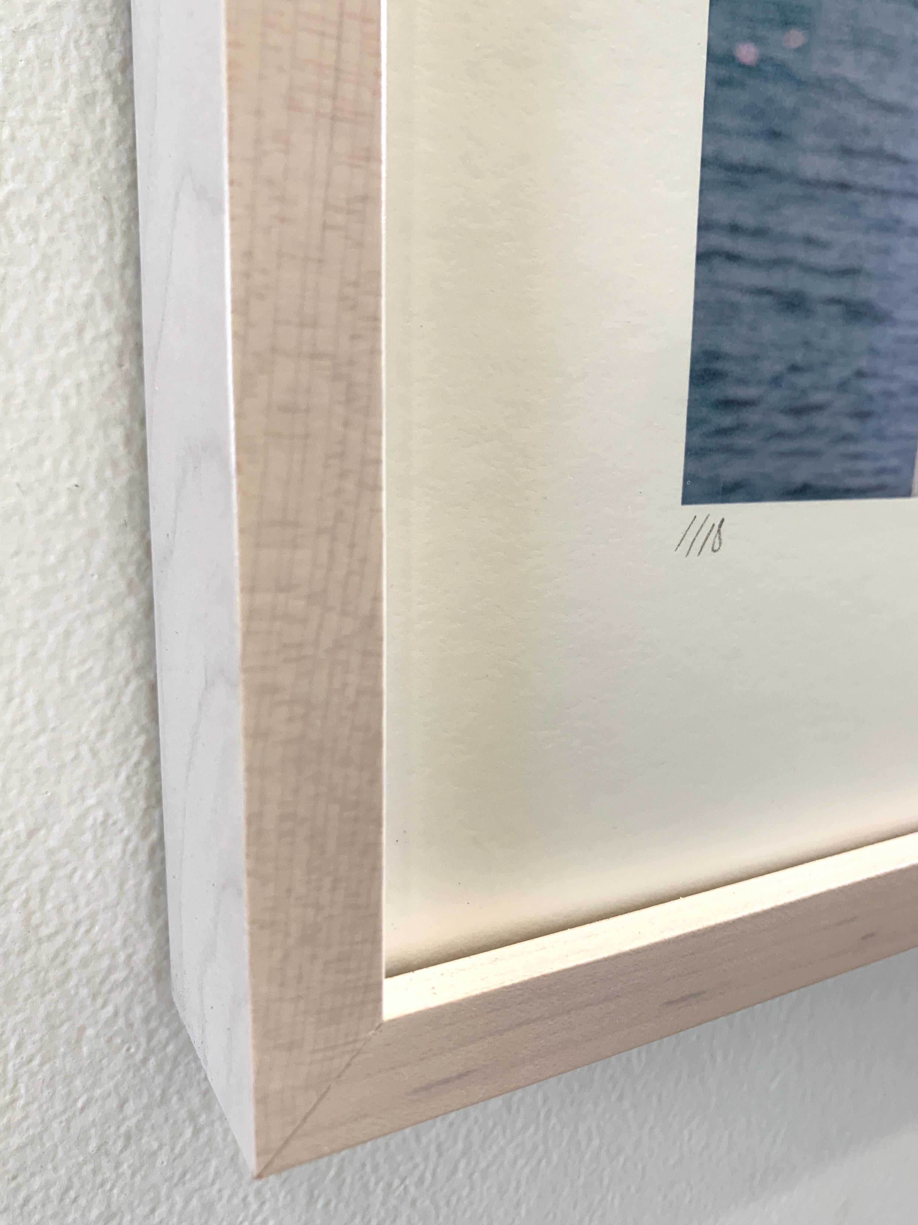 Framed Color Photograph: Woman at blue ocean w/ white arches looking at horizon For Sale 2