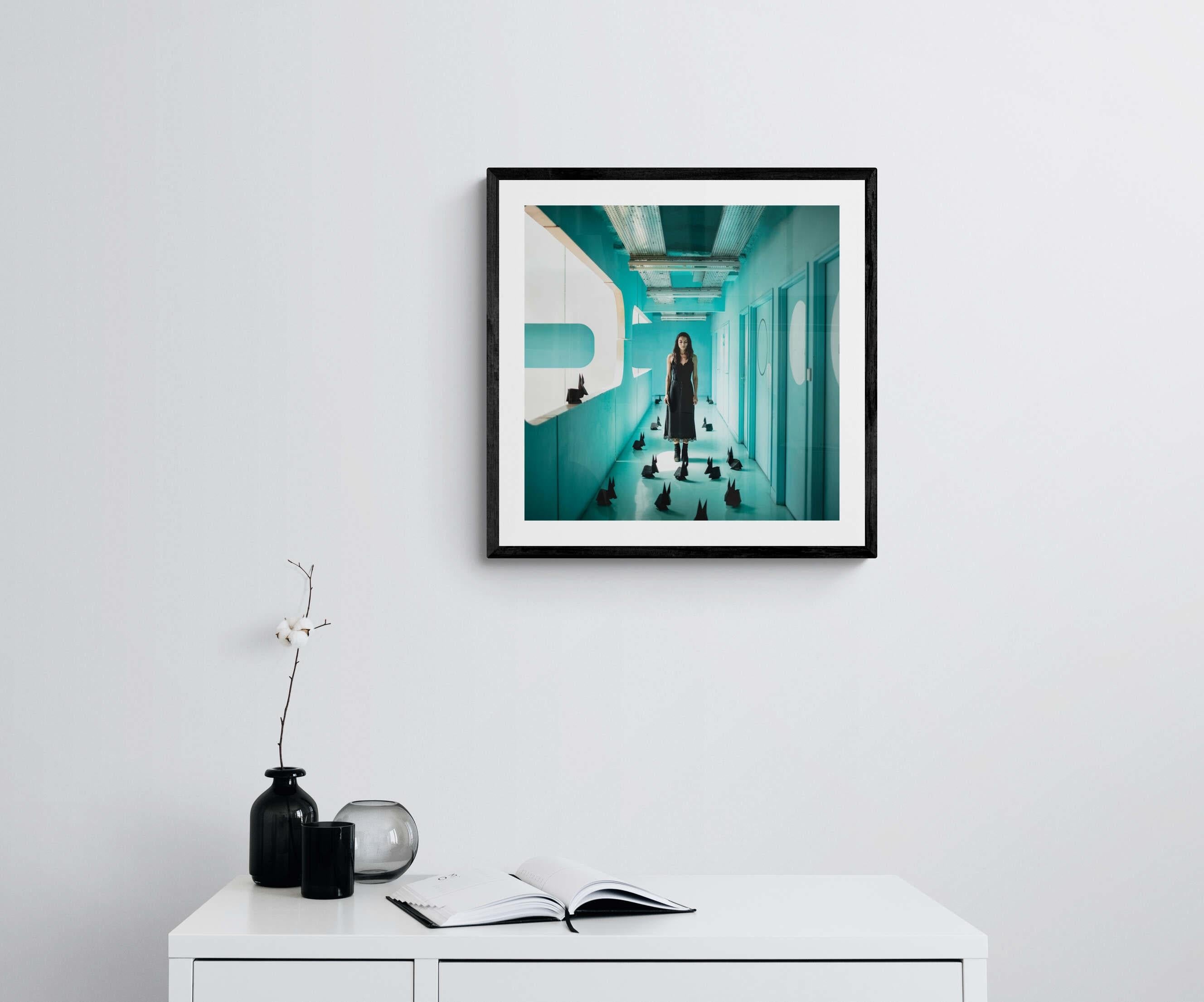 Petite photographie couleur encadrée Femme en architecture turquoise avec lapins origami - Bleu Color Photograph par Dasha Pears