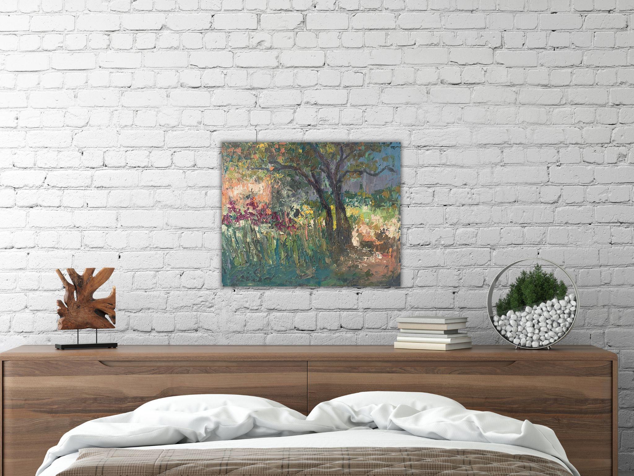 ABOUT THE ARTWORK
In this canvas, the artist has recreated a charming nook of nature where a riot of flowers and greenery unfolds beneath the branches of a majestic tree. Thick and dynamic strokes of paint infuse the scene with texture and vivacity,
