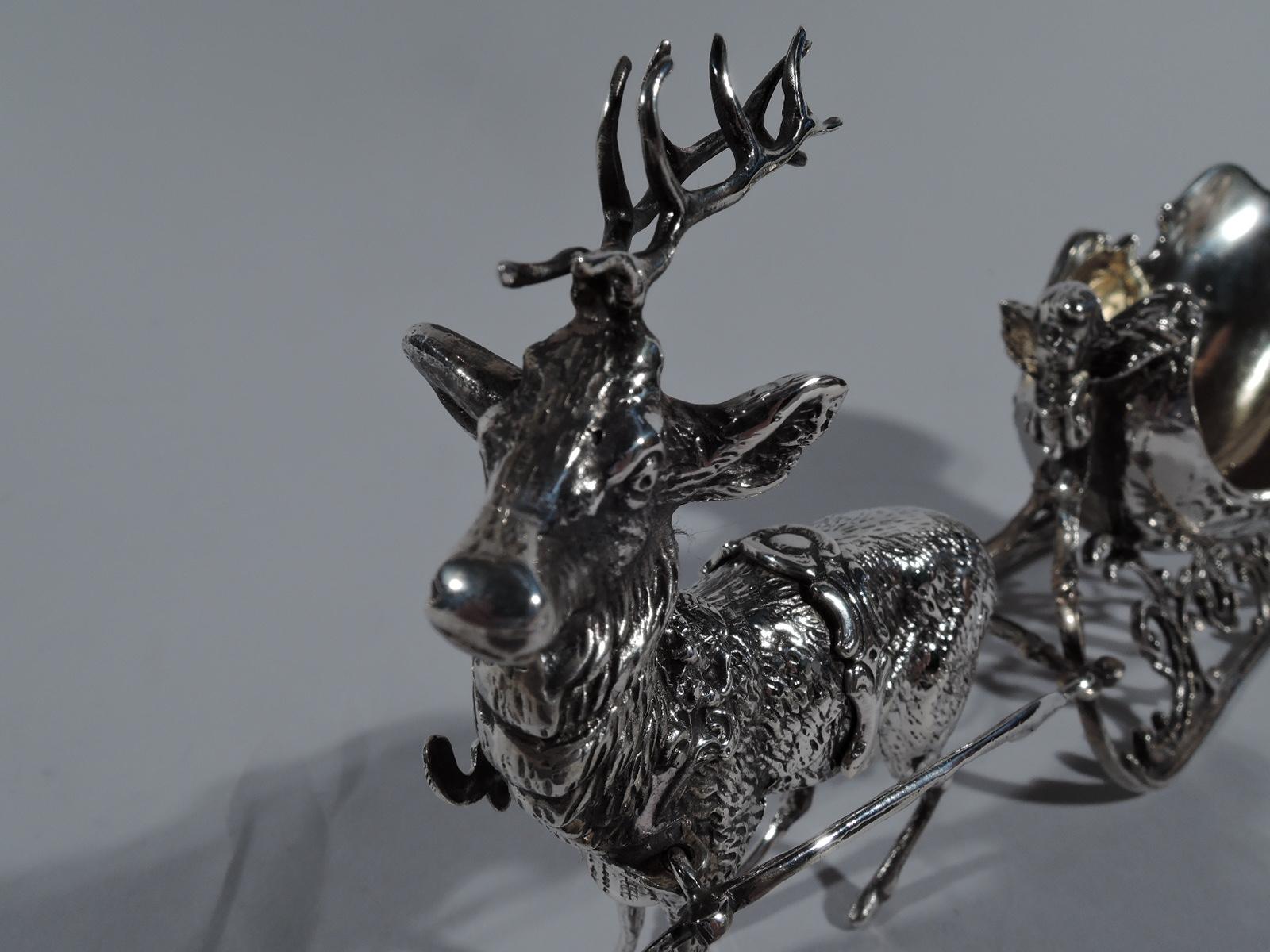 German Dashing through the Snow in a Socially-Distanced Sleigh