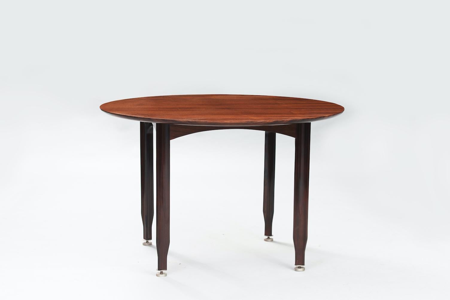 Dassi Lissone Italian Mid-Century Modern round rosewood and stainless steel dining table.