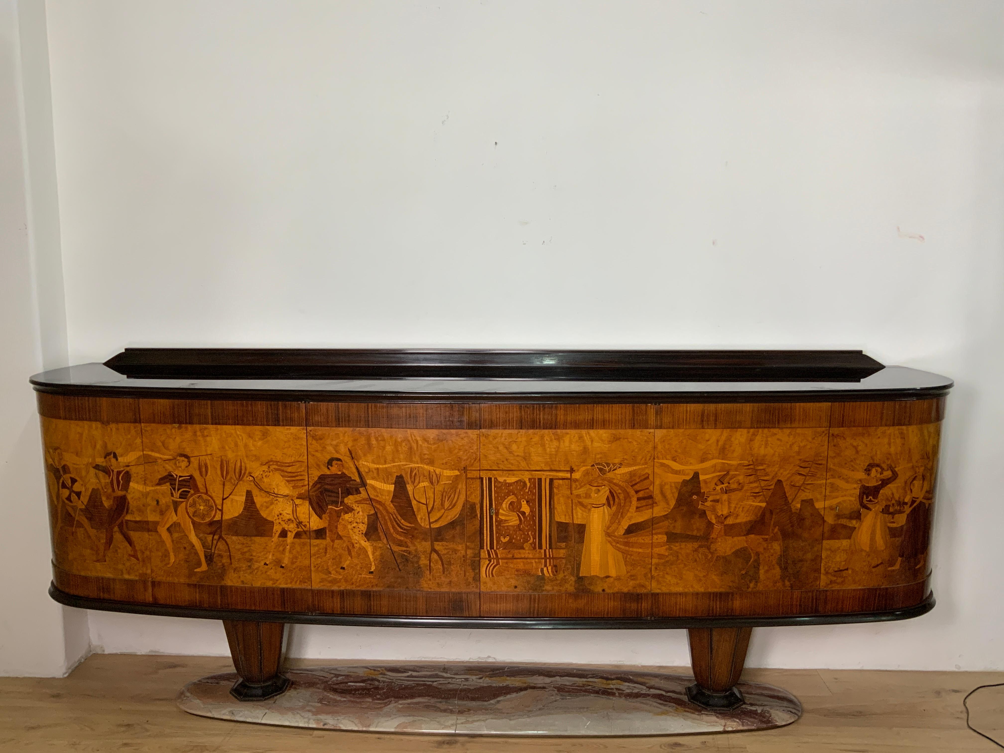 Sideboard Italian manufacture, designed by the artist Vittorio Dassi, in rosewood and maple, sideboard with black glass top and body composed of three pairs of doors.The marble base as you can see from the photos has several repairs, and in the body