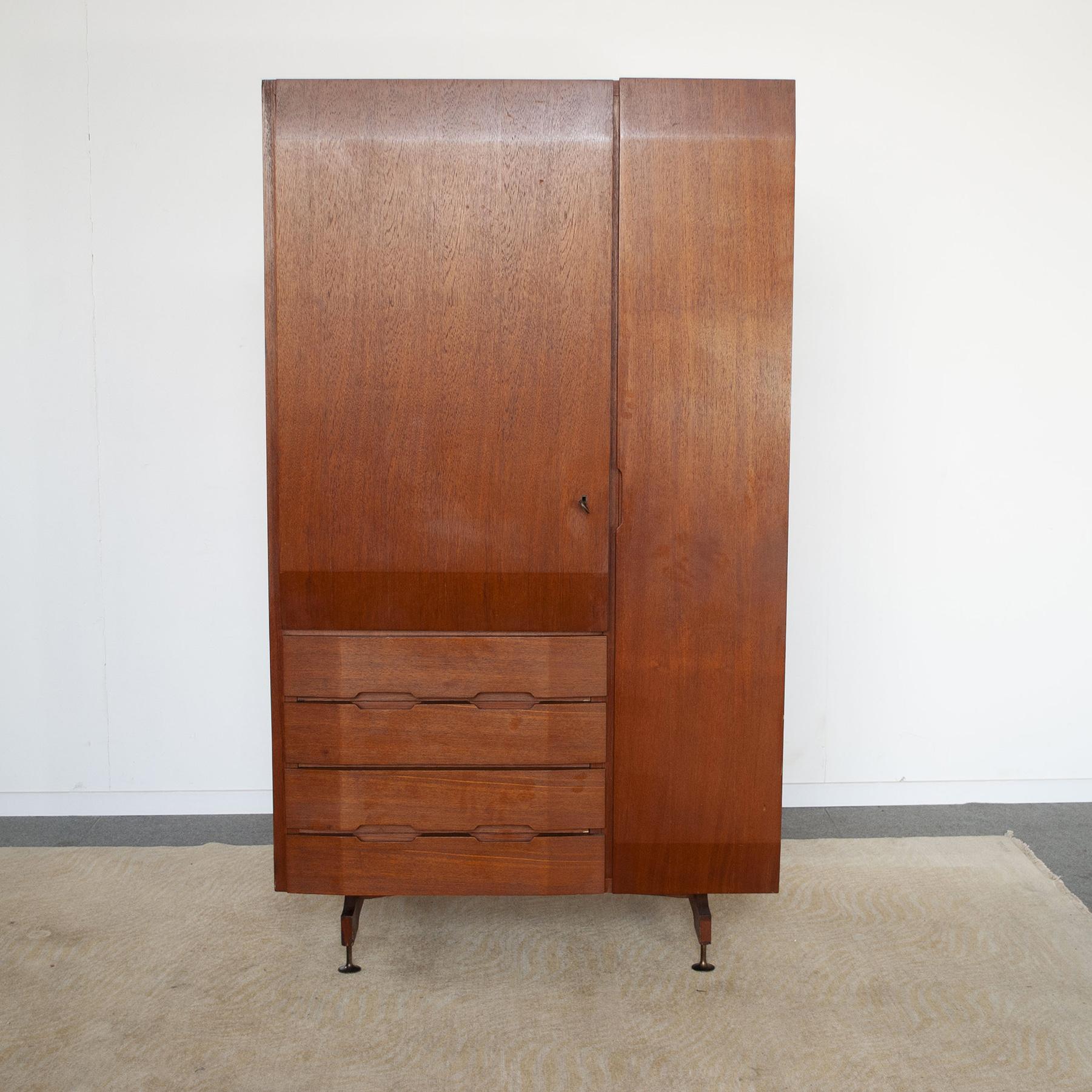 Teak wood storage cabinet with four drawers produced by Dassi mid-sixties.