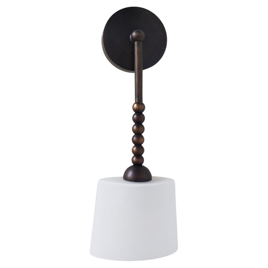 Dast is made of solid brass and white glass.
Finished and assembled by hand. 
The piece features rounded matte glass shade that amplifies the glow from a single point of light.


LED bulb 4W GU9 (or E12/E14) 

Measures: W12 cm / H39 cm. Other