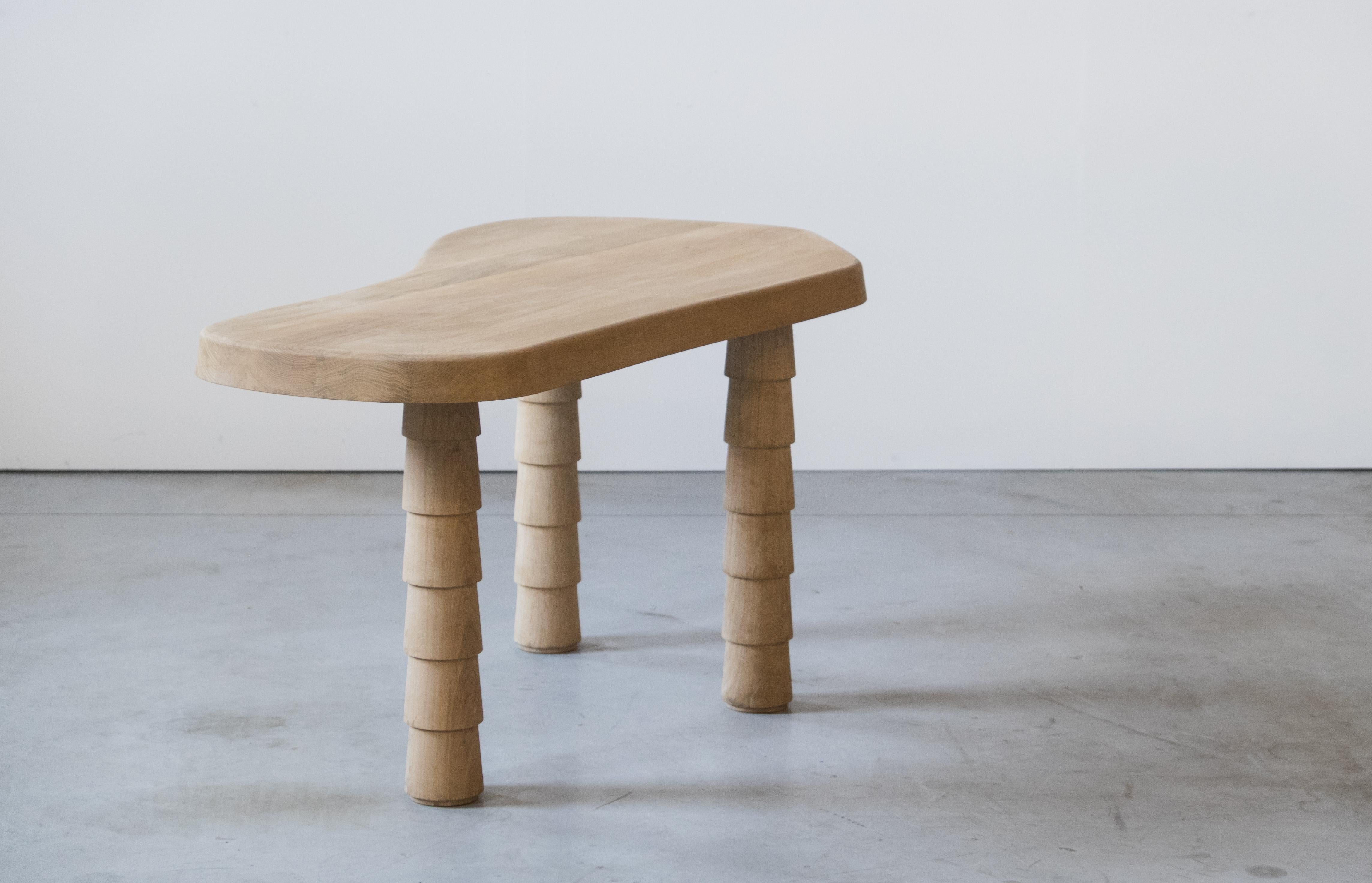 Data table oak XS by Atelier Thomas Serruys
Dimensions: D156 x W82 x H 75cm 3 legs
Materials: Oak.

Available in 4 sizes:
XS- L 156cm W 82cm/52cm H 75cm – 3 legs 
S - L 180cm W 94cm/63cm H 75cm – 3 legs 
M - L 210cm W 110cm/73cm H 75cm – 3