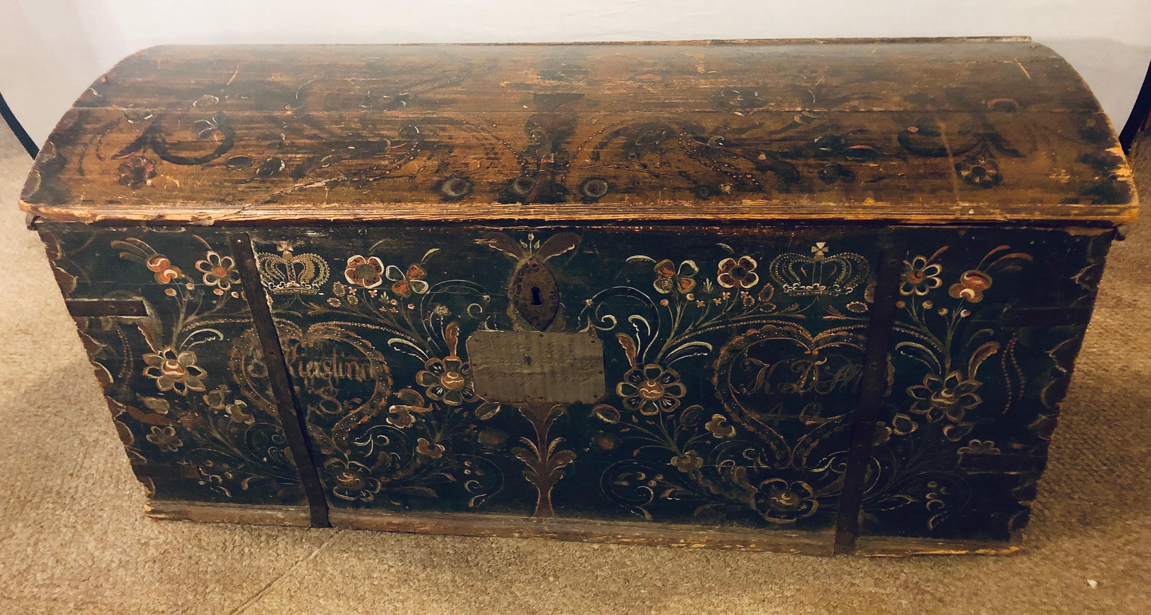 A dated, signed, inscribed 1840 incredibly detailed original painted dowry chest or trunk with original lock and key. This large and impressive chest even bears the original metal engraved presentation given to the groom. Bearing the kings crest in