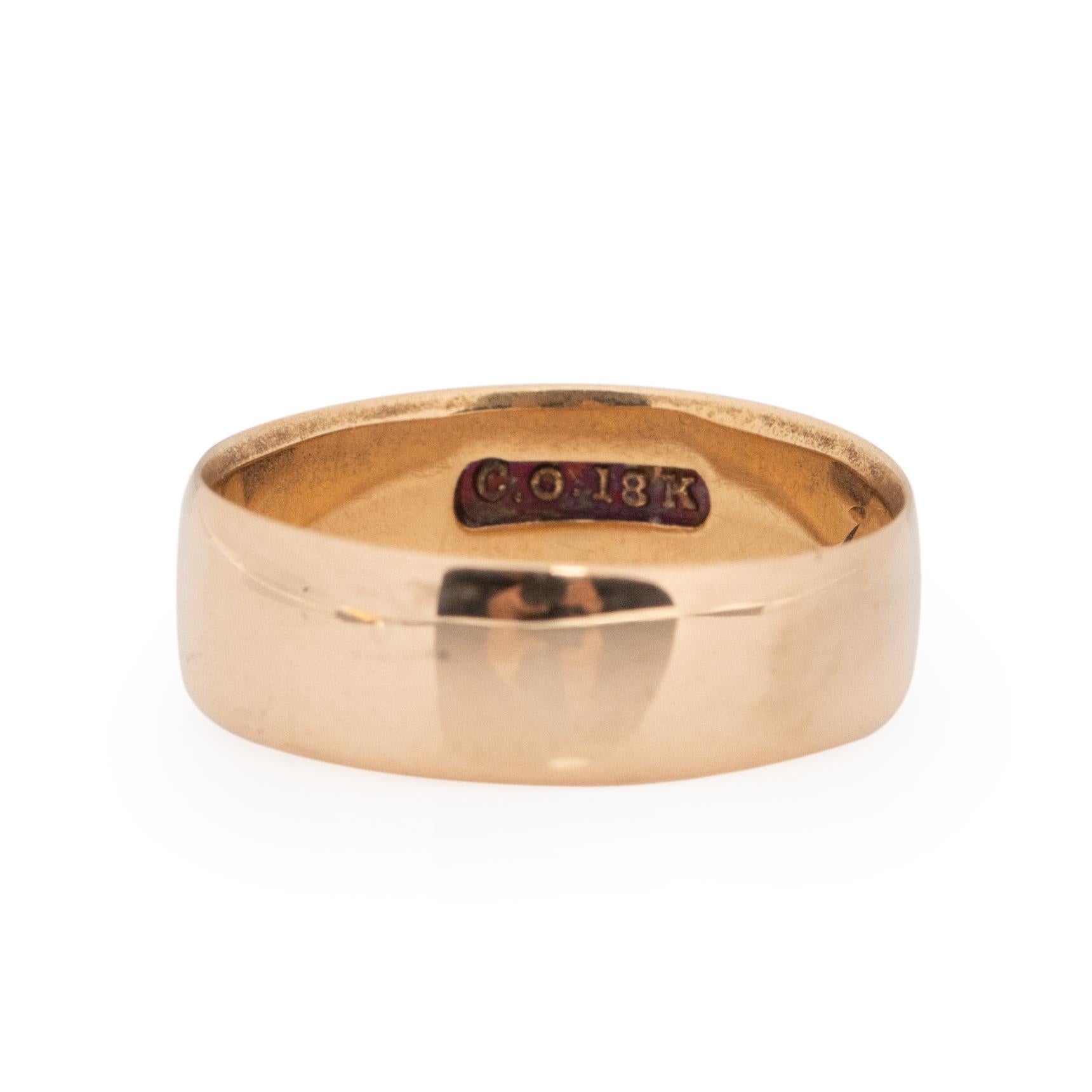 This rose gold beauty is a fun, versatile piece. With a love note engraved inside the shank (C.P to M.F. 6/26/07. Crafted in 18K rose gold this wide and has a thin thickness and a sleek look. Great for men or woman, this ring could be stacked with