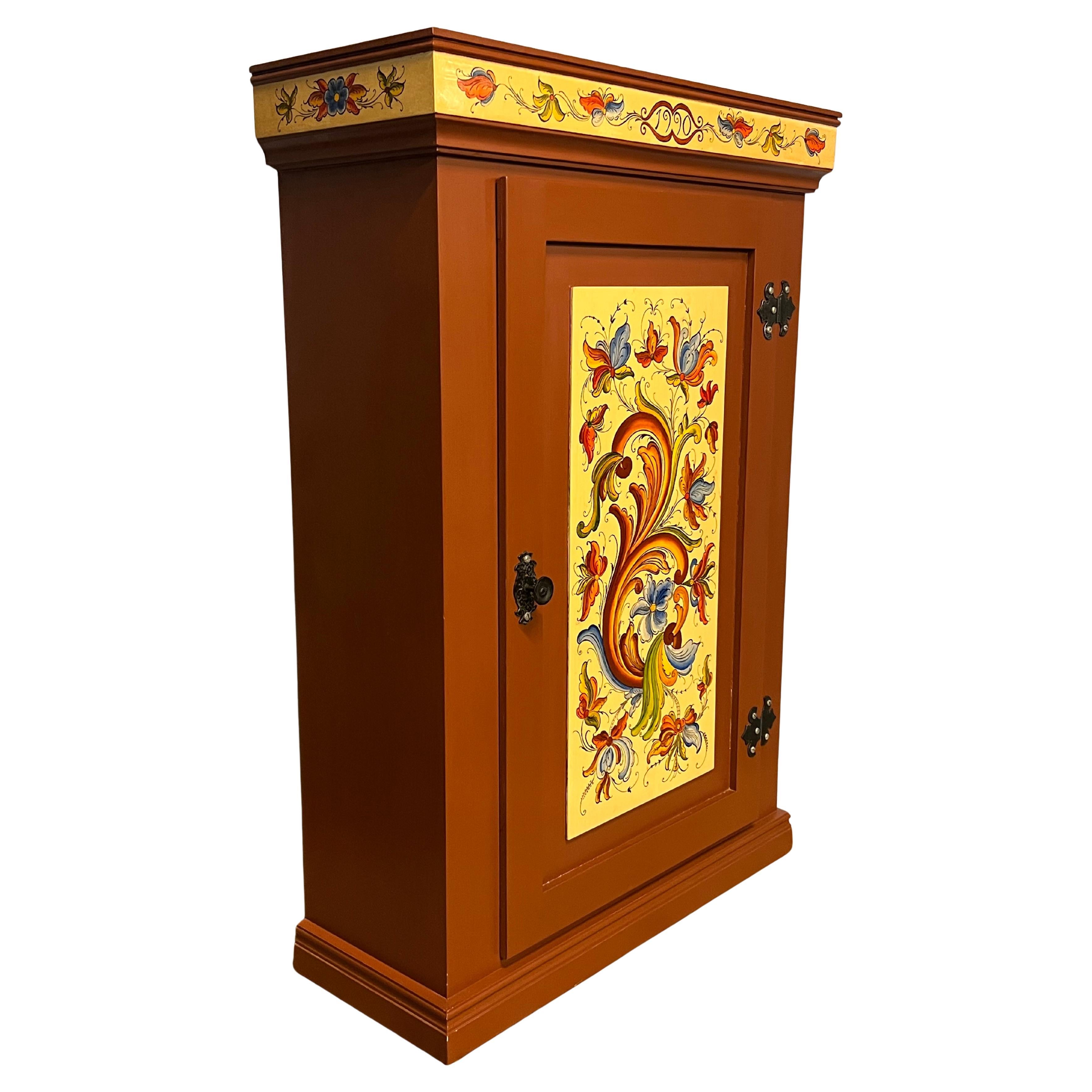 Elevate your space with this stunning Norwegian Folk Art wall-hanging Cabinet / Cupboard / Sideboard, a true masterpiece of craftsmanship and tradition. Handcrafted from natural pine wood by a skilled artisan in 1990, this piece showcases the