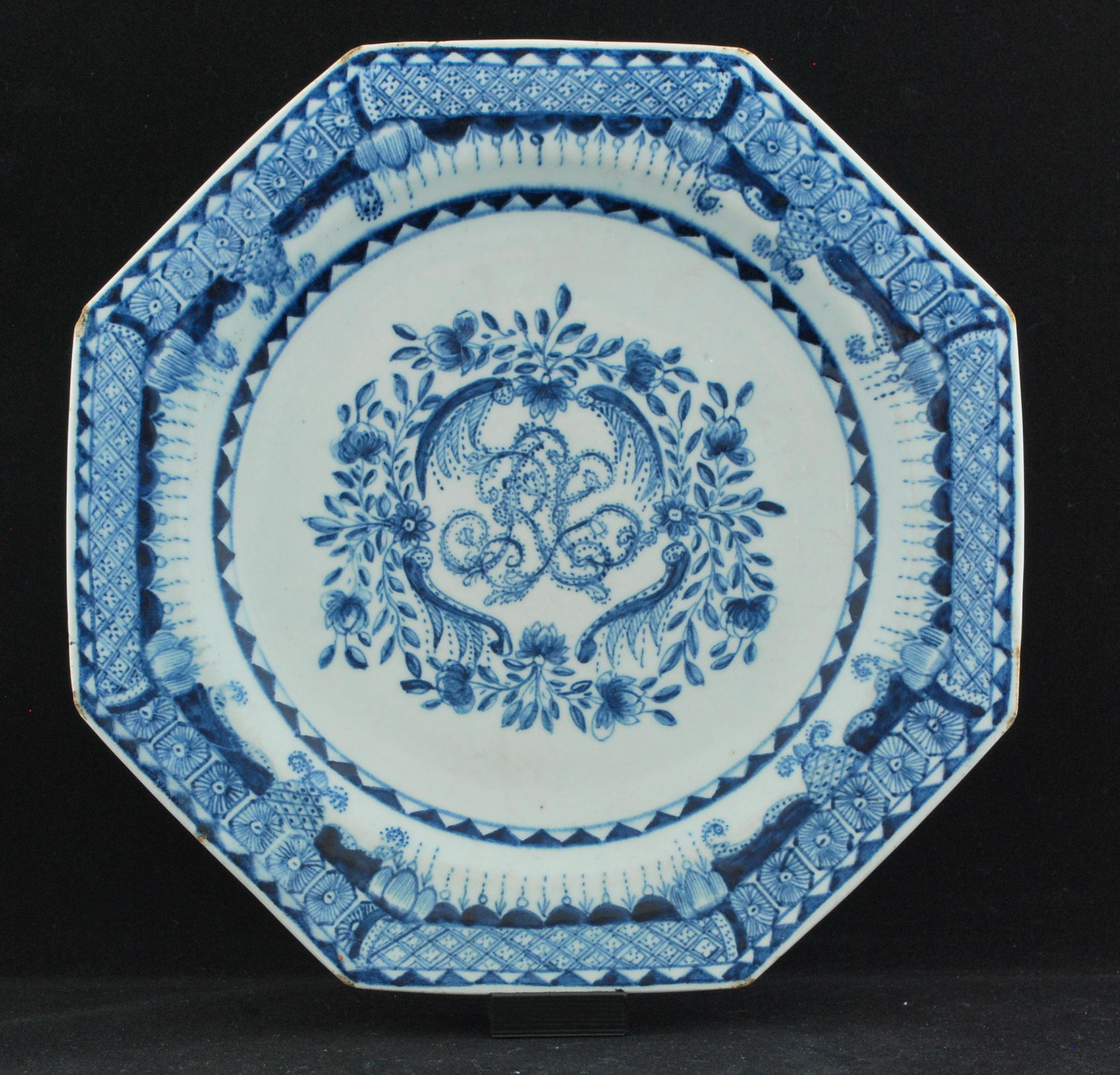 The so-called ‘Crowther Plate’ dated January 1770:

Octagonal, painted in blue underglaze with the monogram ‘RC’ in a floral cartouche and with elaborate scroll, pendant and cell and foliage rim borders with stylized pineapples. The underside in