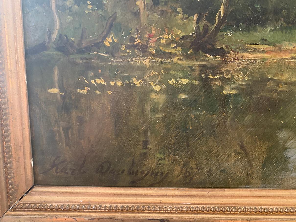 Peinture Panneau « The artist's boat workshop » (L'atelier de bateaux de l'artiste) Daubigny Karl (1846-1886) en vente