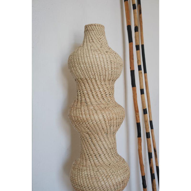 Daughter vase by RRR.ES 
Dimensions: D30 x H100 cm
Materials: Palm Leaf, Reed Structure

Every piece is unique and different. Sizes and shapes can have variations.

Also Available: Mother, Father, Son & Baby A Vases, 

These pieces are 100% made of