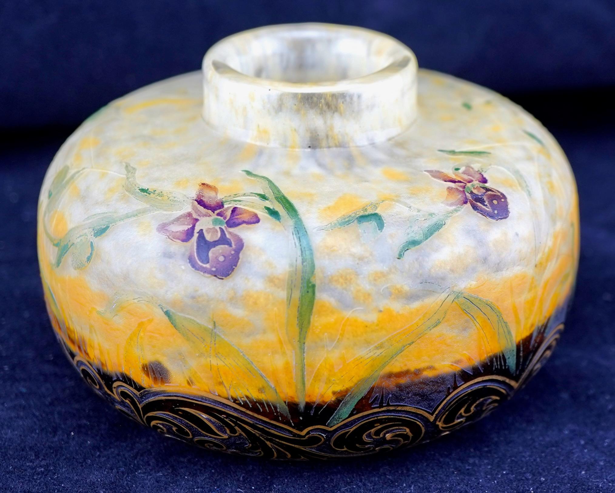 Daum Acid etched and enameled vase. Finely painted orchid flowers decoration. Spiderweb etched background.  Great Art Nouveau item. The vase in signed 