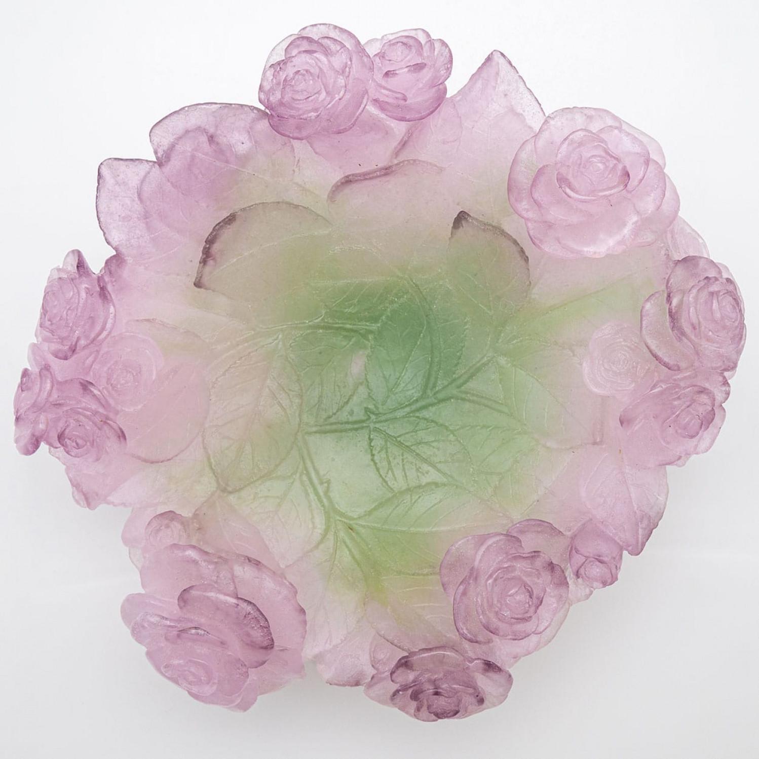 Luxury at its finest, high-end glass plate with roses by Daum, France.

This exquisite Art Nouveau dish by Daum exemplifies the mastery of French glassmaking. Crafted using the pâte de verre technique, the dish features a delicate acid-etched design