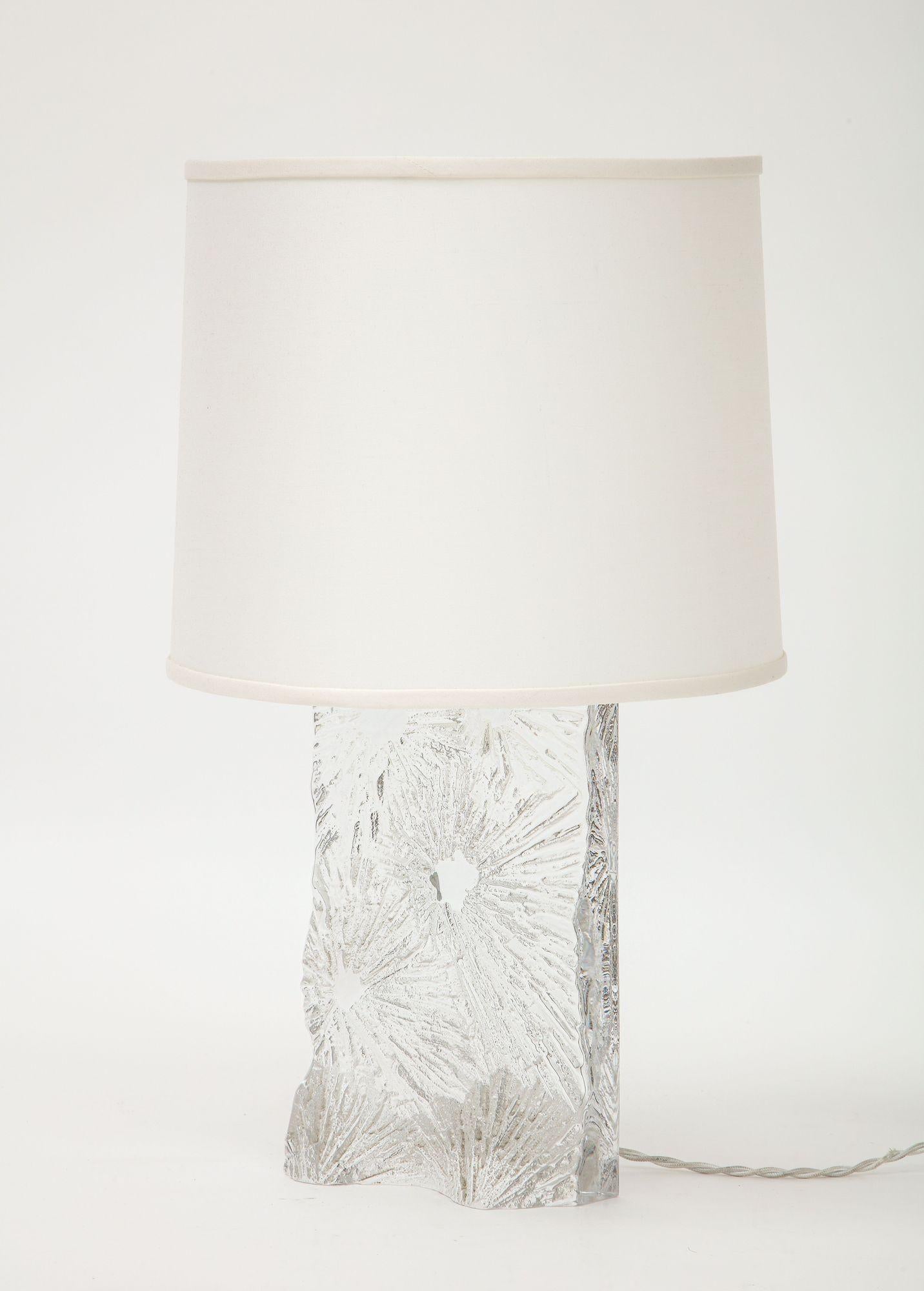 A great Crystal table lamp by Daum with acid engraved Chardon motif, signed on the bottom.