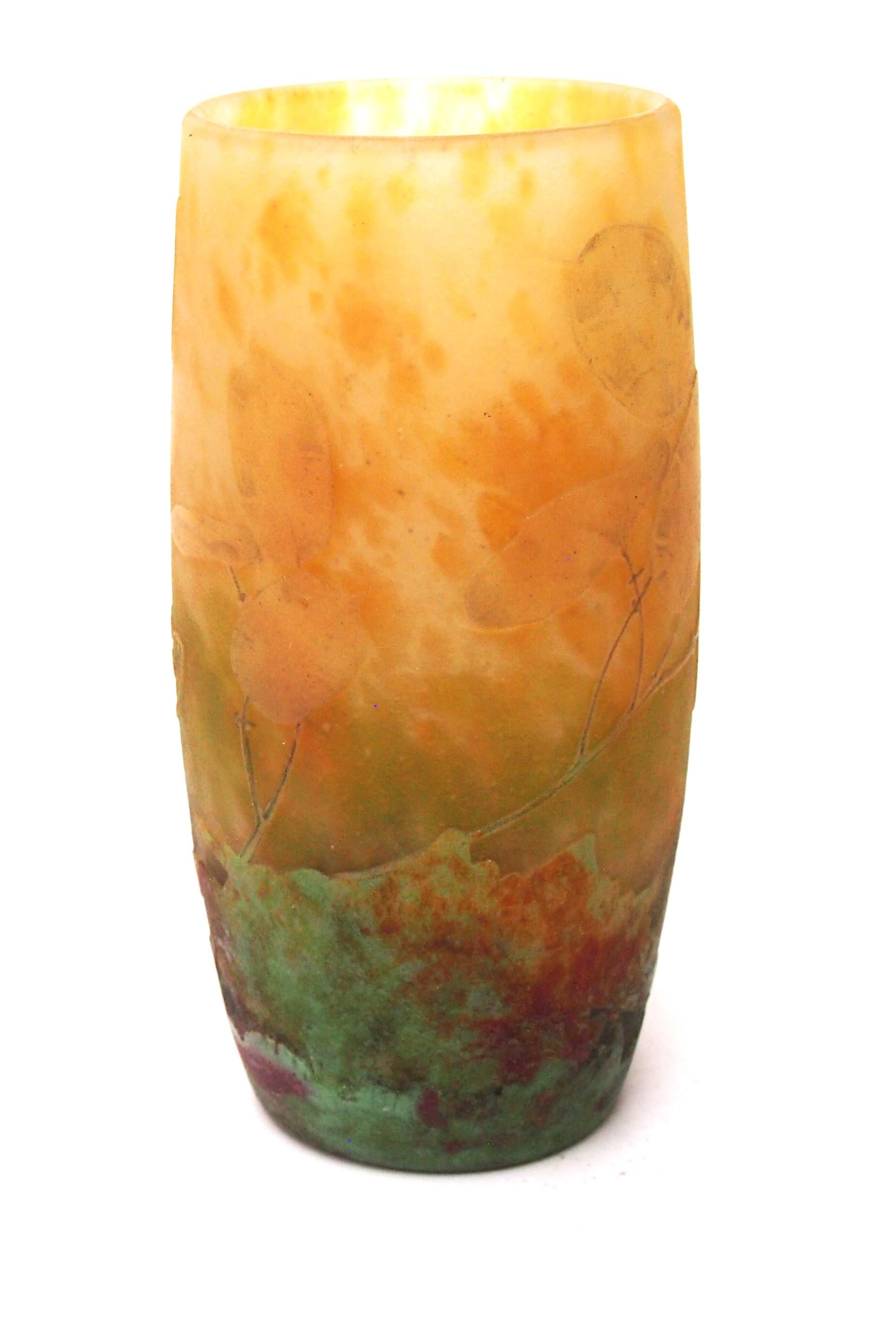 Cute Daum Honesty barrel vase -Polychrome enamelled and cameo depicting Honesty (also known as monnaie du pape) showing its ripe pods against an autumnal background.  It is in the classic Daum barrel shape and layered in mottled oranges and ambers