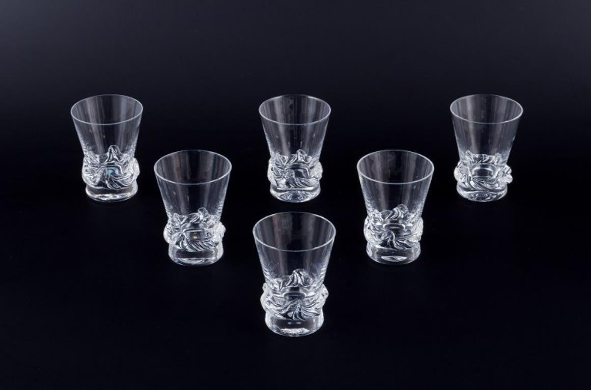 Daum, France.
A set of six large vodka glasses.
Handcrafted in clear mouth-blown glass.
Approximately 1960s/70s.
Signed Daum, France.
Perfect condition.
Dimensions: H 7.5 cm x D 5.5 cm.