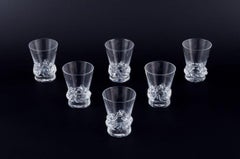 Daum, France. A set of six large vodka glasses. Clear mouth-blown glass.