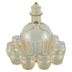 Daum, France, Art Deco decanter and set of eight liqueur glasses.