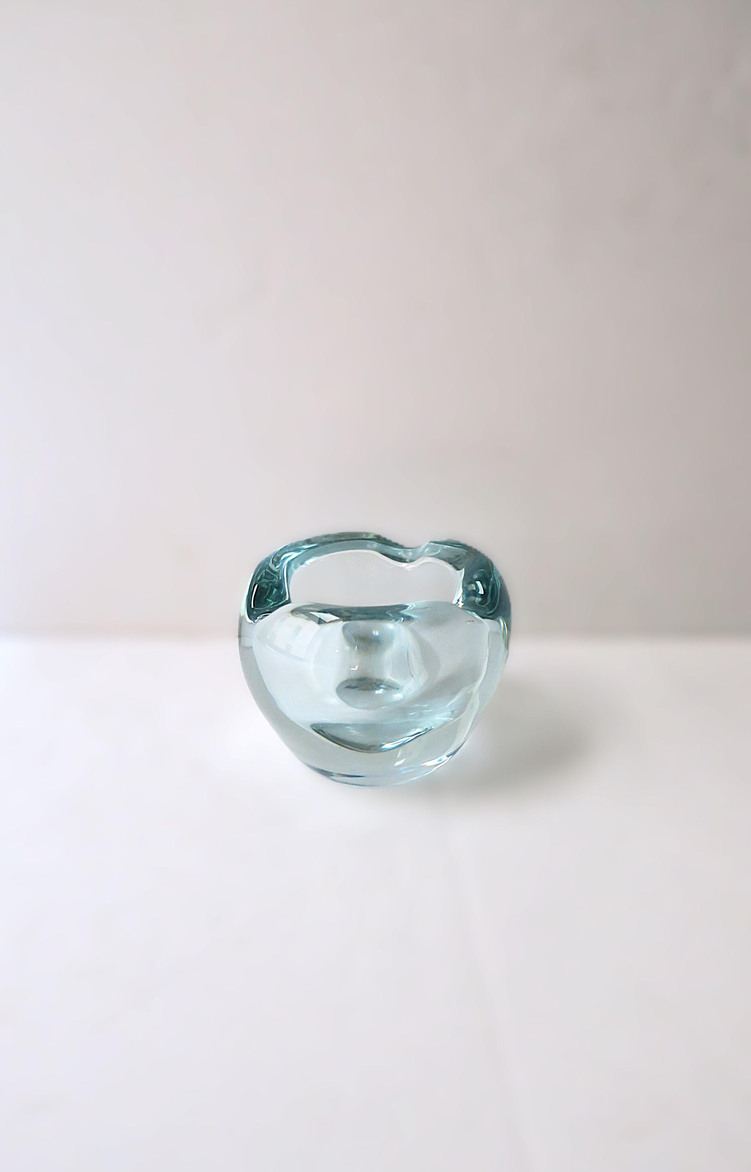 A beautiful and substantial light blue French crystal bowl or ashtray, organic modern design, from luxury Maison, Daum, France, circa mid-20th century. Piece is a light blue with a soft organic shape. A great addition to any table,