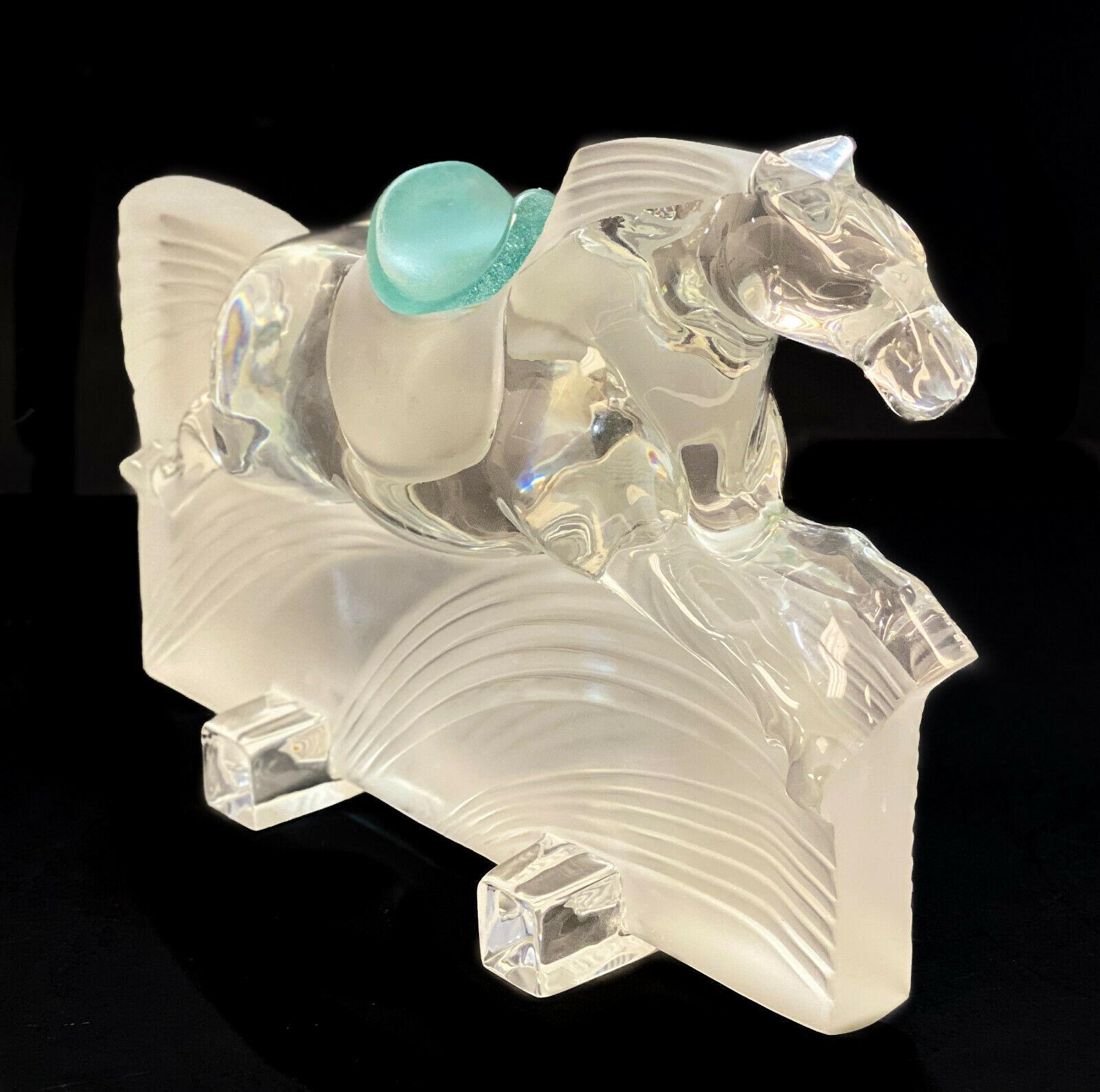 Daum France crystal glass frosted to clear Ming Race horse saddle sculpture. Turquoise pate-de-verre to the saddle. Marked Daum France to the edge of the base.

Weight Approx., 10 lbs 

Measures Approx., 11 inches x 4 inches x 8 inches
         