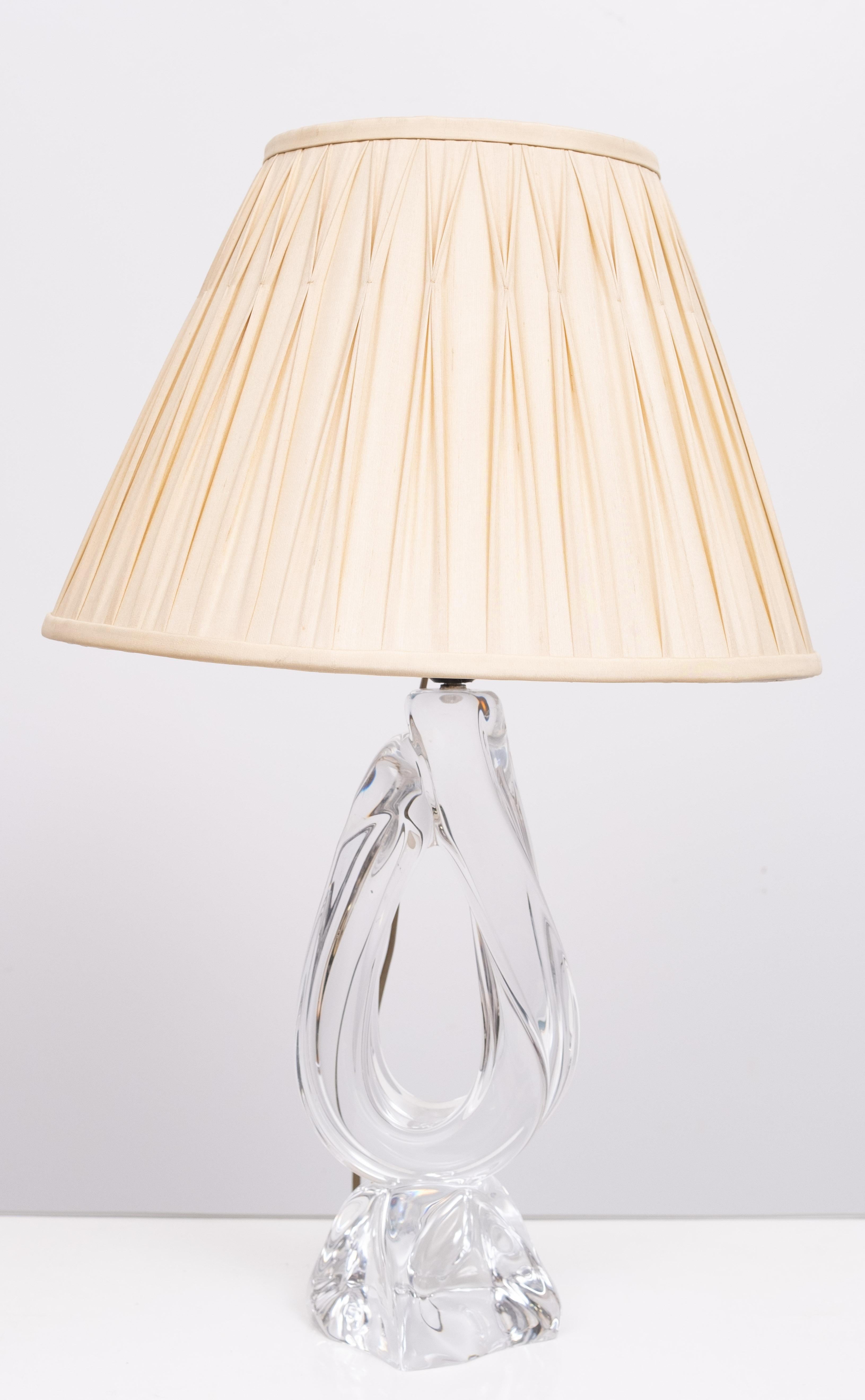 Beathiful Crystal Glass  lamp stand . Signed Daum France .
1960s ,comes with a Laura  Ashley shade . Good condition . 