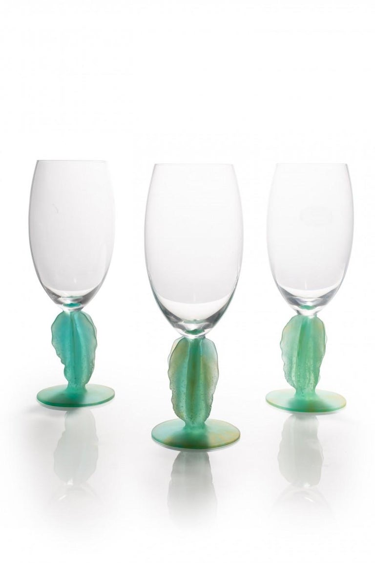 Daum crystal glass with a pâte de verre cactus shaped feet. The designer Joseph Hilton McConnico began his collaboration with Daum France in 1987, and was the first American whose work became part of the Louvre's permanent Decorative Arts