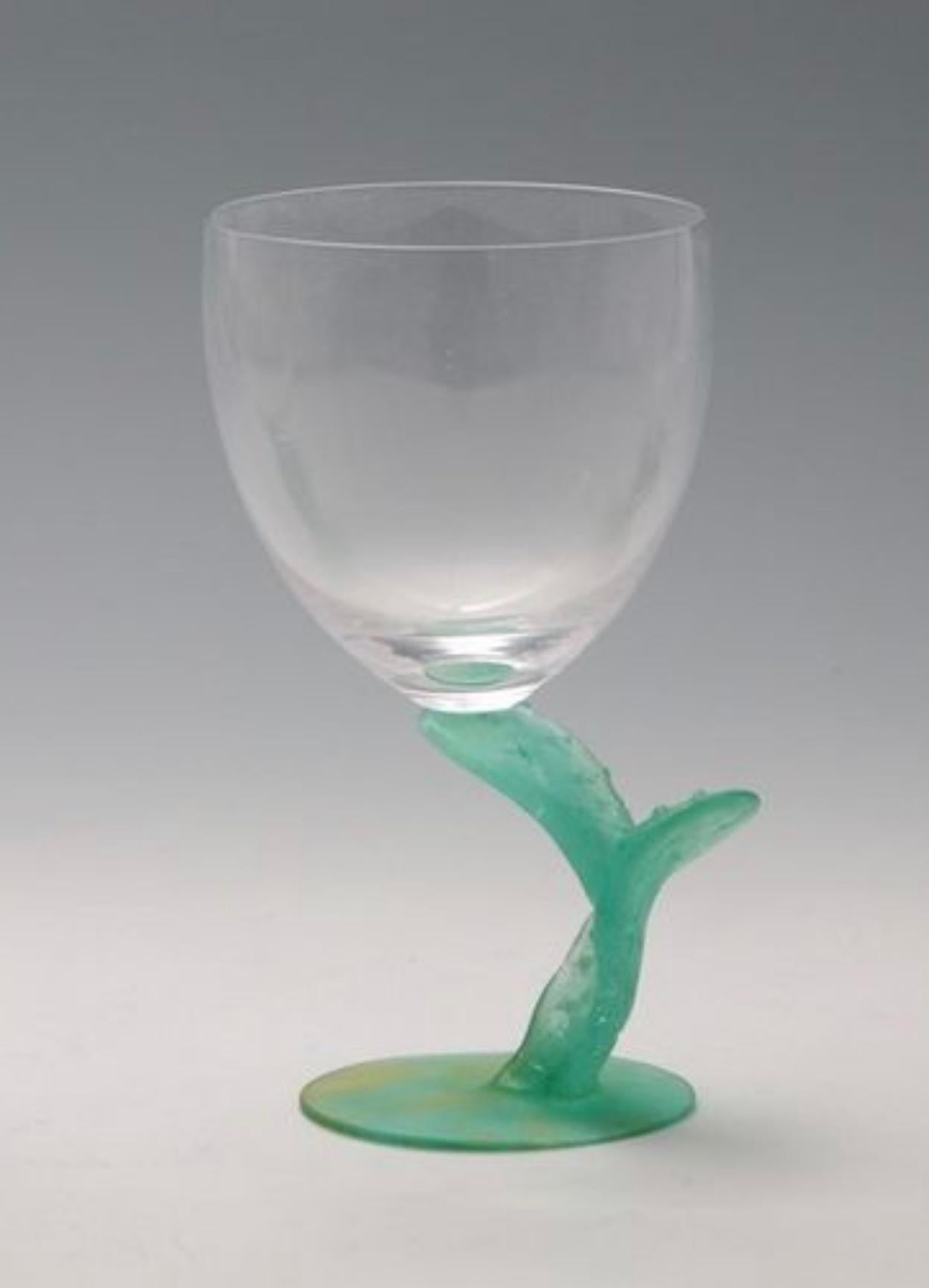 Daum crystal glass with a pâte de verre cactus shaped feet. The designer Joseph Hilton McConnico began his collaboration with Daum France in 1987, and was the first American whose work became part of the Louvre's permanent Decorative Arts