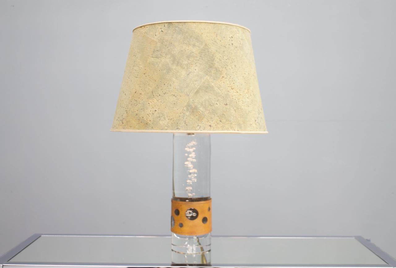 Beautiful glass table lamp with bubbles inside. Signed with Daum France. Very good condition with original fabric and Leather. No damages.
Dimension without the shade: H 36 cm, DM 10.5cm.

Very good condition

 
