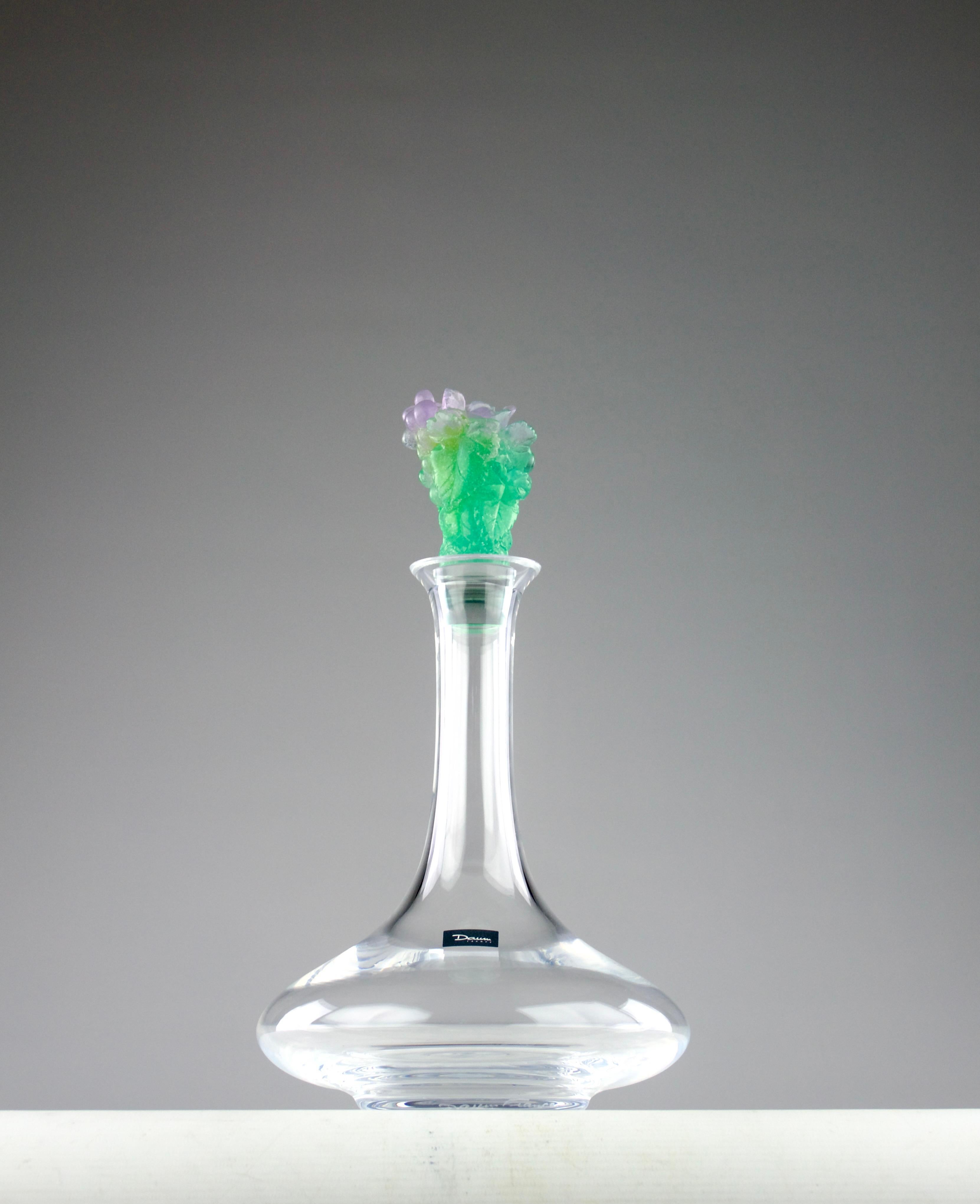 Superb Daum France decanter with its beautiful stopper in glass paste in the shape of a grape vine and its leaves. Signed Daum France, with its original box.

Carafe in as new condition, box has signs of use.

Two carafes available.

Dimensions in