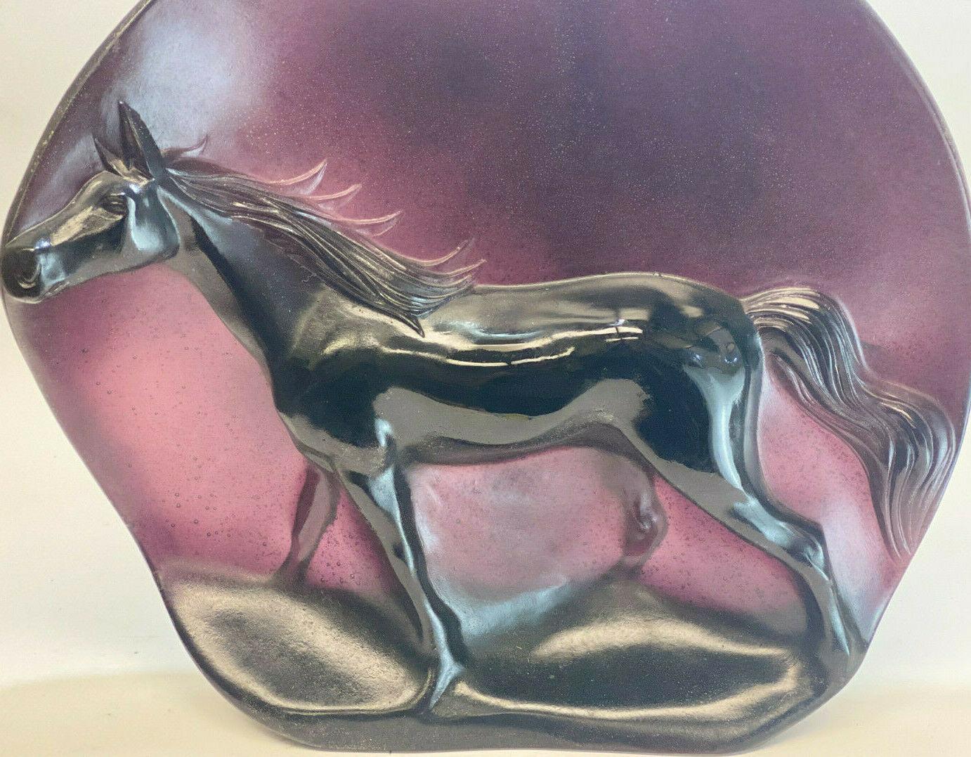 Daum France amethyst pâte de verre horse sculpture, Camargue by Guy Petitfils. Marked Daum France along with the artist's embossed signature to the verso. Limited edition of 150. 

Weight approximate, 20 lbs

Measures approximate: 16.5 inches x