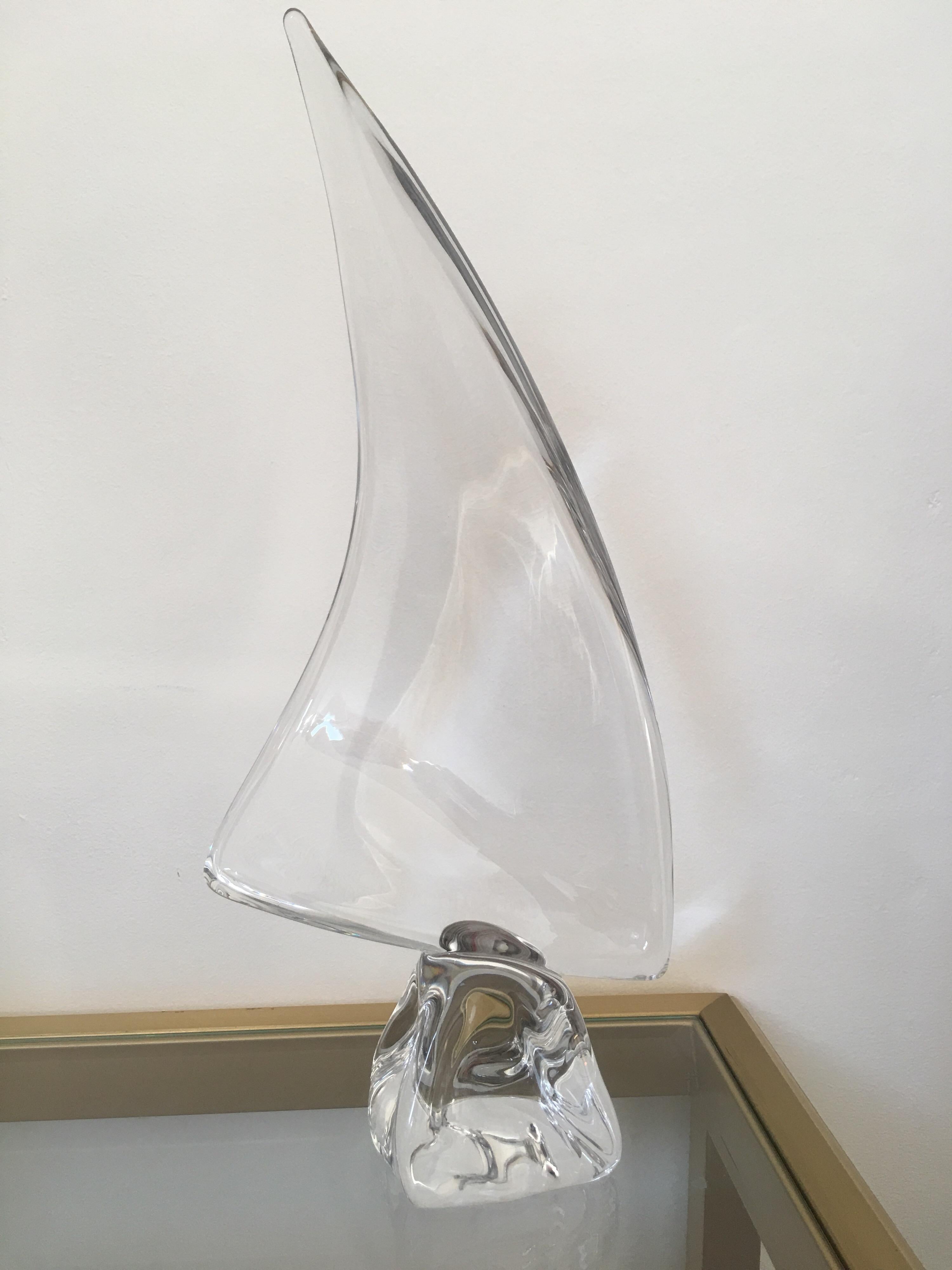Discounted price especially for Christmas.
Beautiful crystal sculpture representing a stylized sailboat, designed by Daum in the 1960s. It's a large model and it is signed DAUM FRANCE on the crystal base.
It is in excellent condition, no scratches.
 