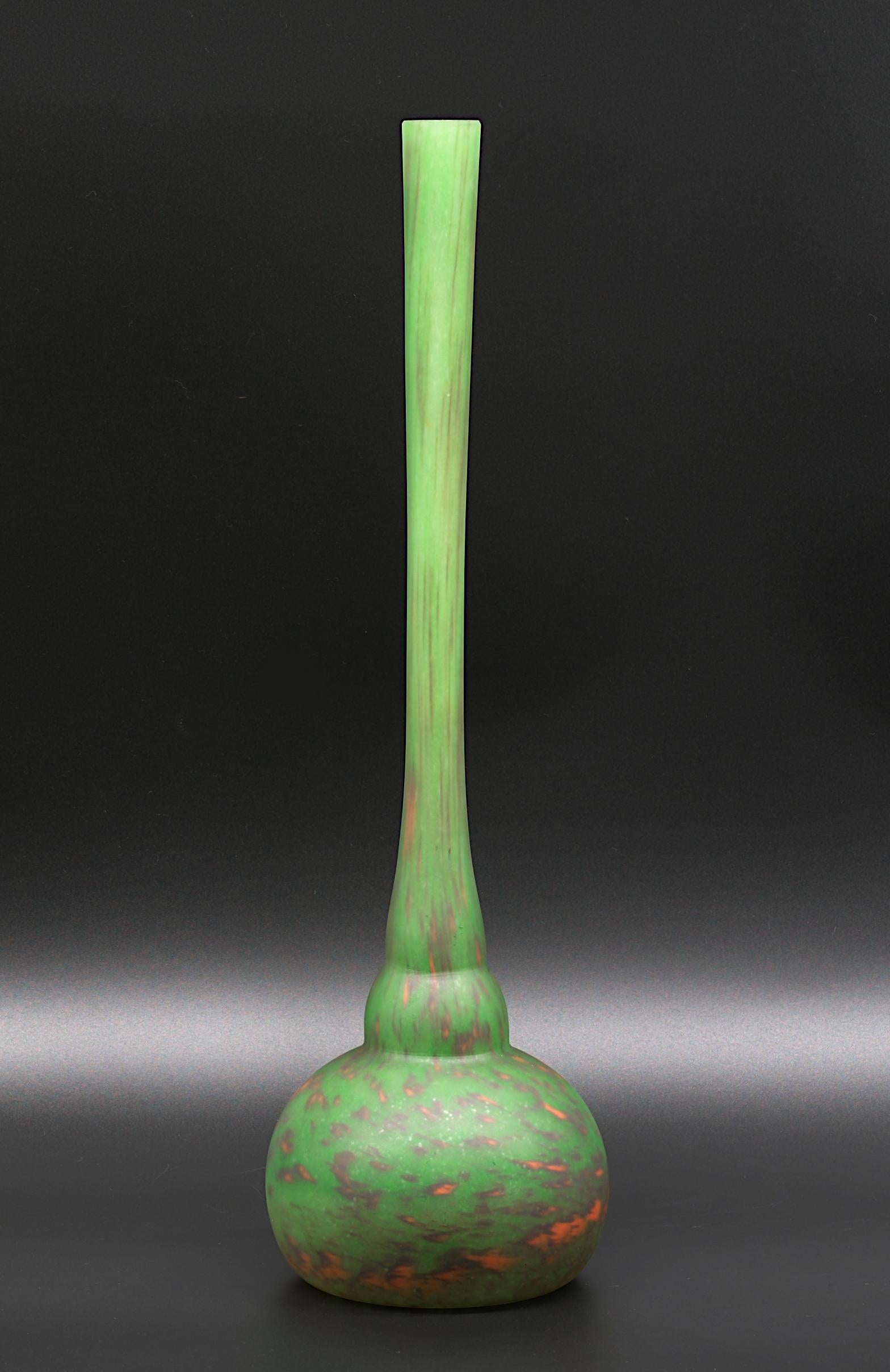 French Art Deco mottled double glass single-flower vase called berluze by DAUM (Croismare, Nancy), France, late 1920s. Green, dark blue and orange enamels are applied between the two layers. Height : 16