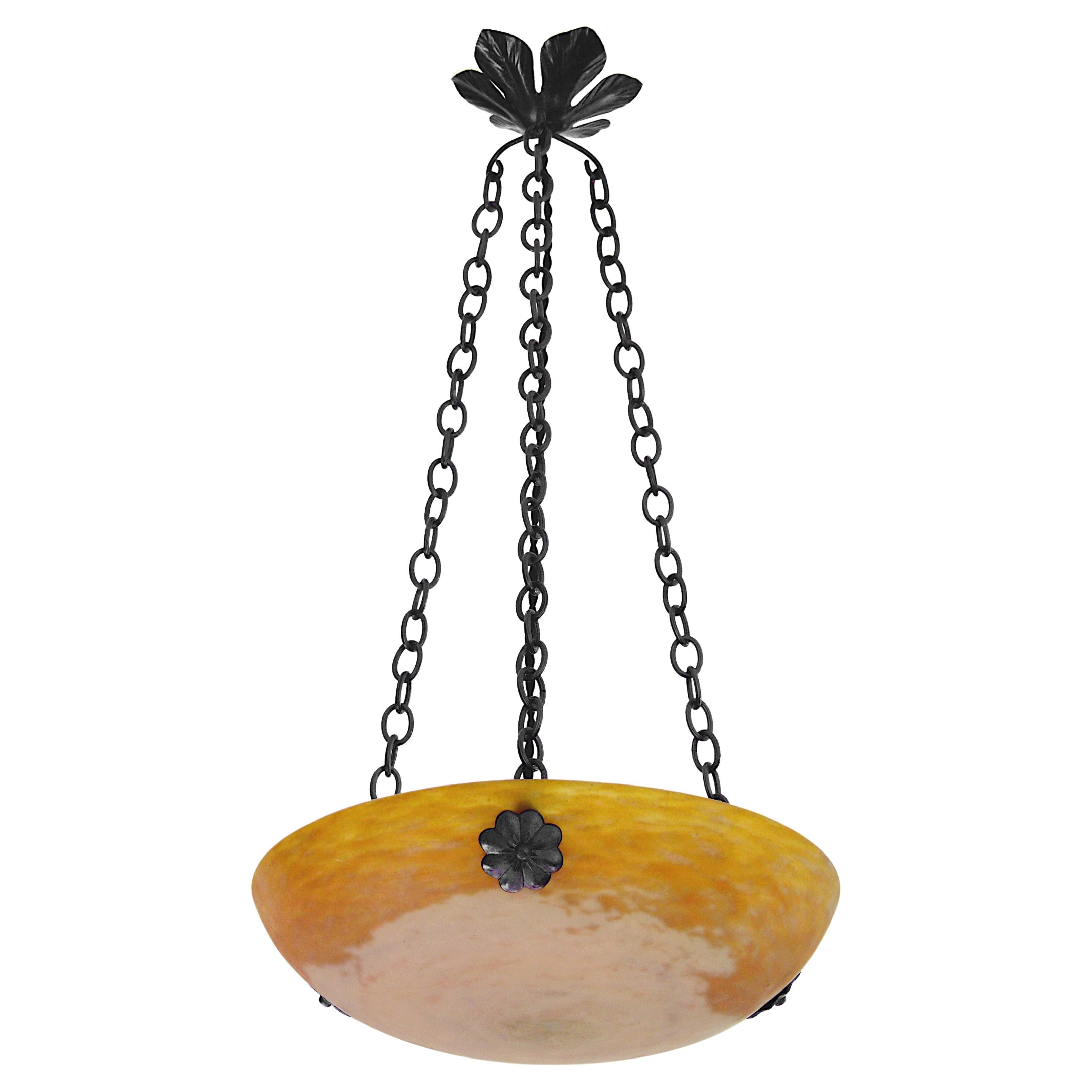 French pendant chandelier by Daum (Nancy), France, 1900-1905. Blown double glass shade hung at its original wrought iron frame. Colors: ochre, white sand and pink. Height 26.2