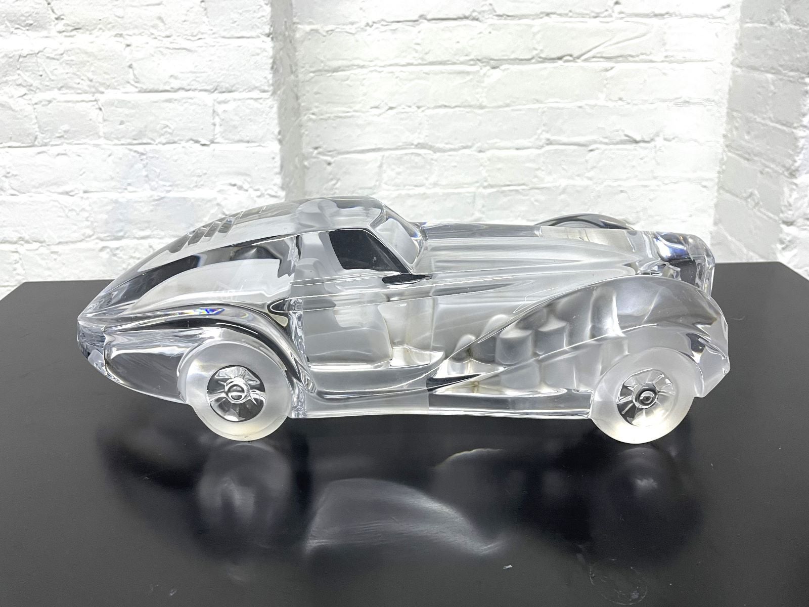 Daum French Crystal Riviera Coupe Car.   Highly detailed large glass depiction of a classic car with frosted tires and engine. Designed by Xavier Froissart.  Signed Daum France.