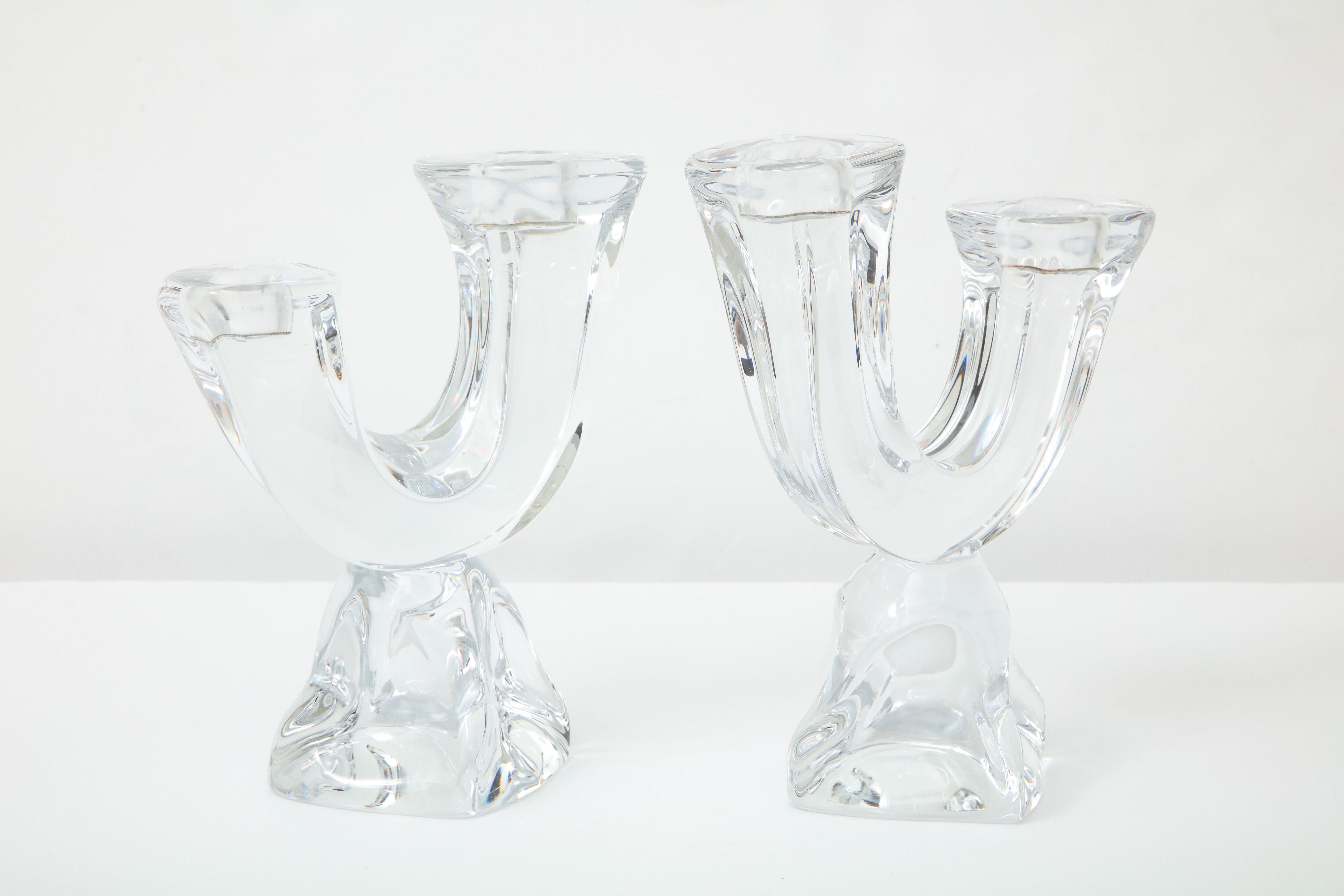Pair of moderist solid crystal candlesticks each holding 2 candles, Daum crystal. Signed.
