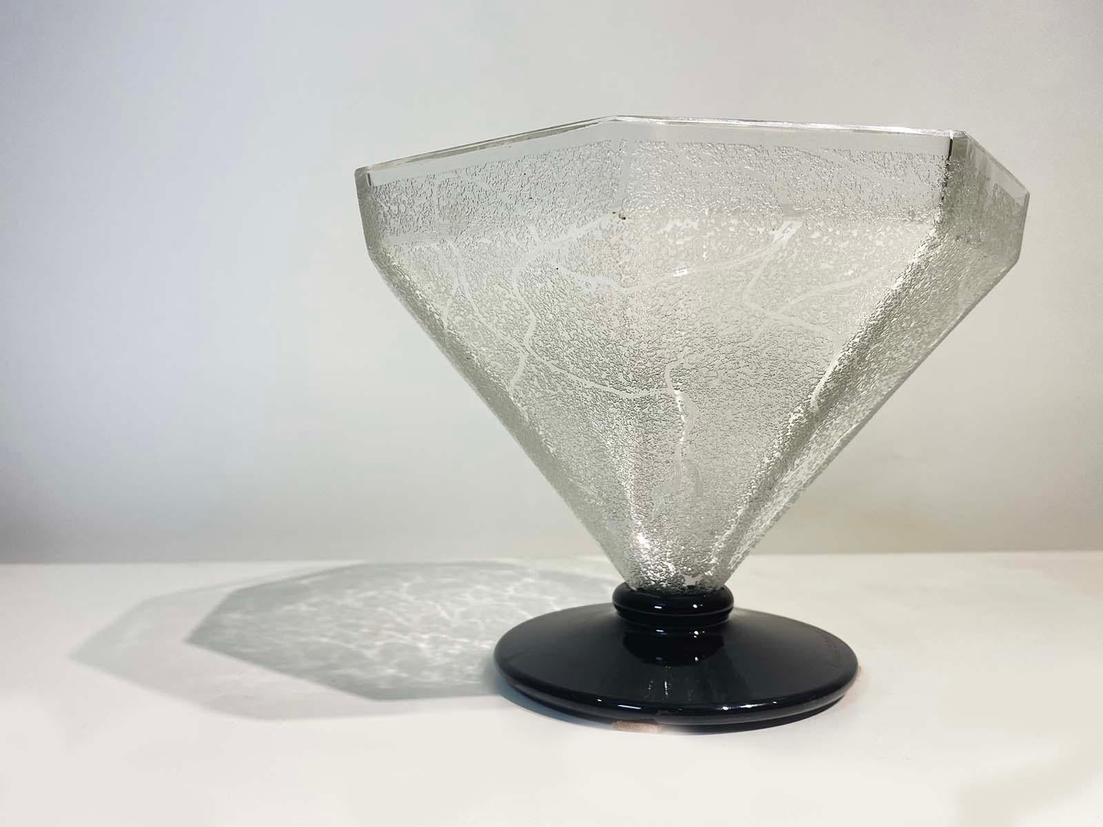 A beautiful acid etched vase signed Daum Nancy, france on it's black base circa 1930's
Founded in 1878 by Jean Daum (1825–1885) in Nancy, France, Daum represents one of the preeminent studios of high quality glass and crystal in France's history.