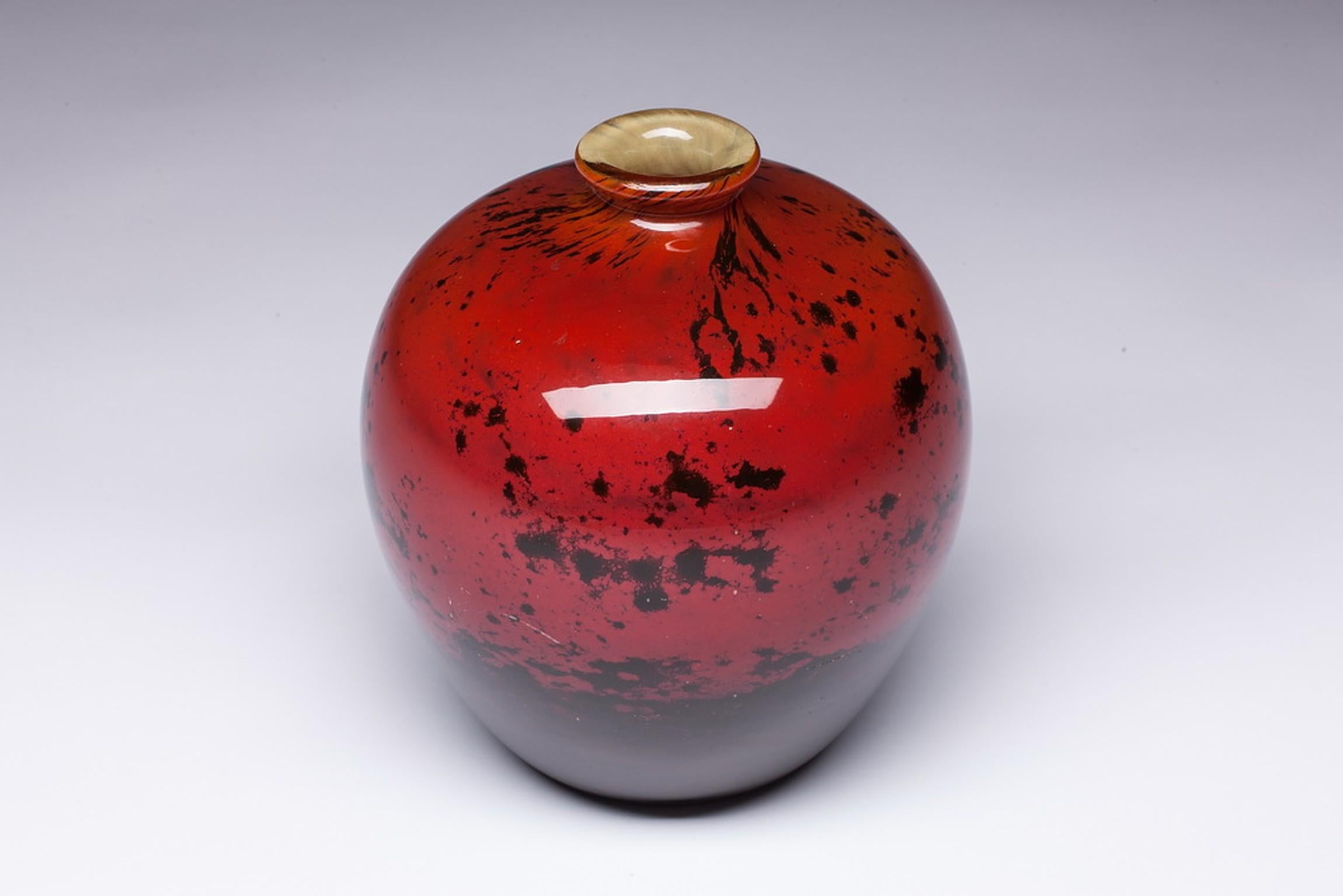 Daum Nancy Art Deco Decorative Vase. Daum vase ovoid shape with tight neck in blown glass with red and black color background. The signature is at the bottom of the vase. The signature is engraved.

notary Jean Daum in 1878: He acquired a local