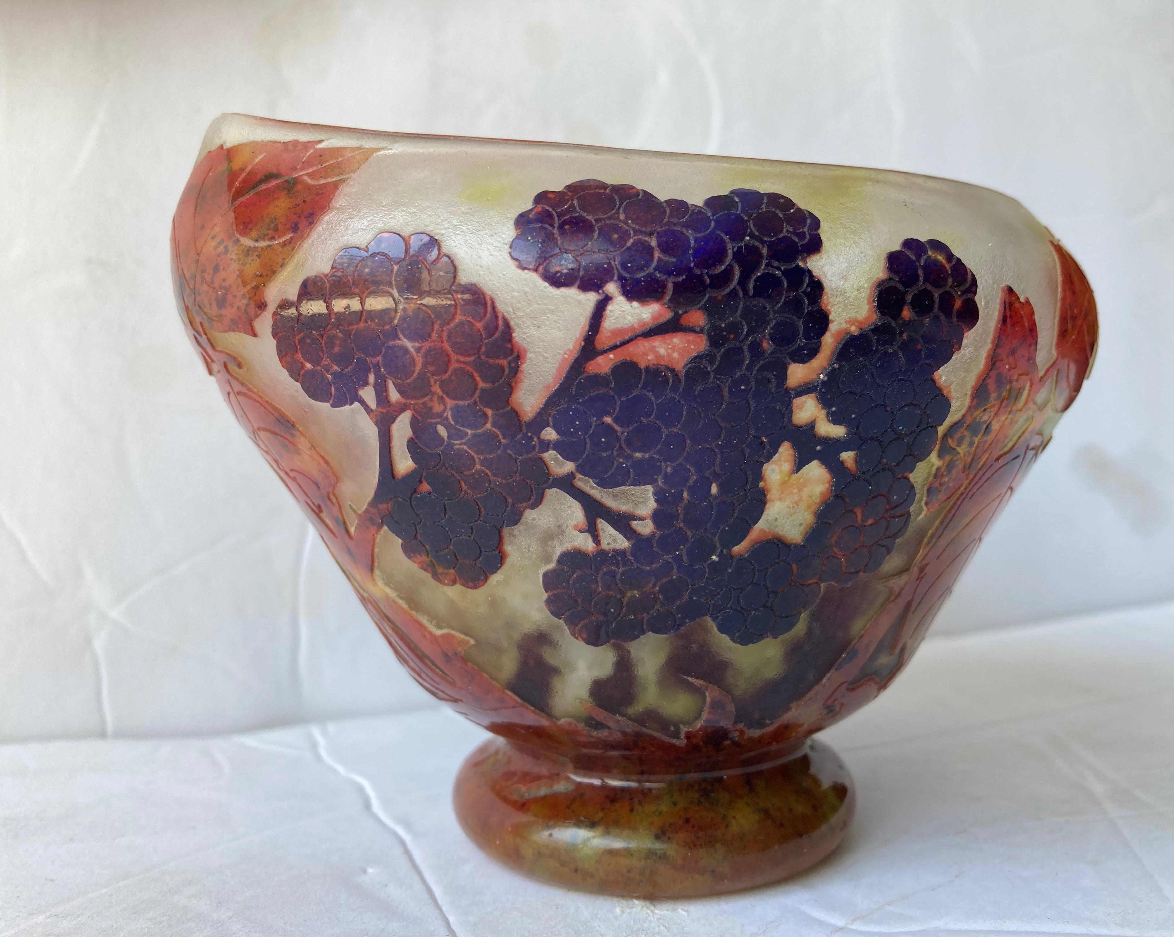 This is a beautiful sample of the art glass in France from the 19th to the early 20th century by the Daum Freres. Great traditional boat vase/footed bowl shape. Plus marked with the Croix De Lorraine.