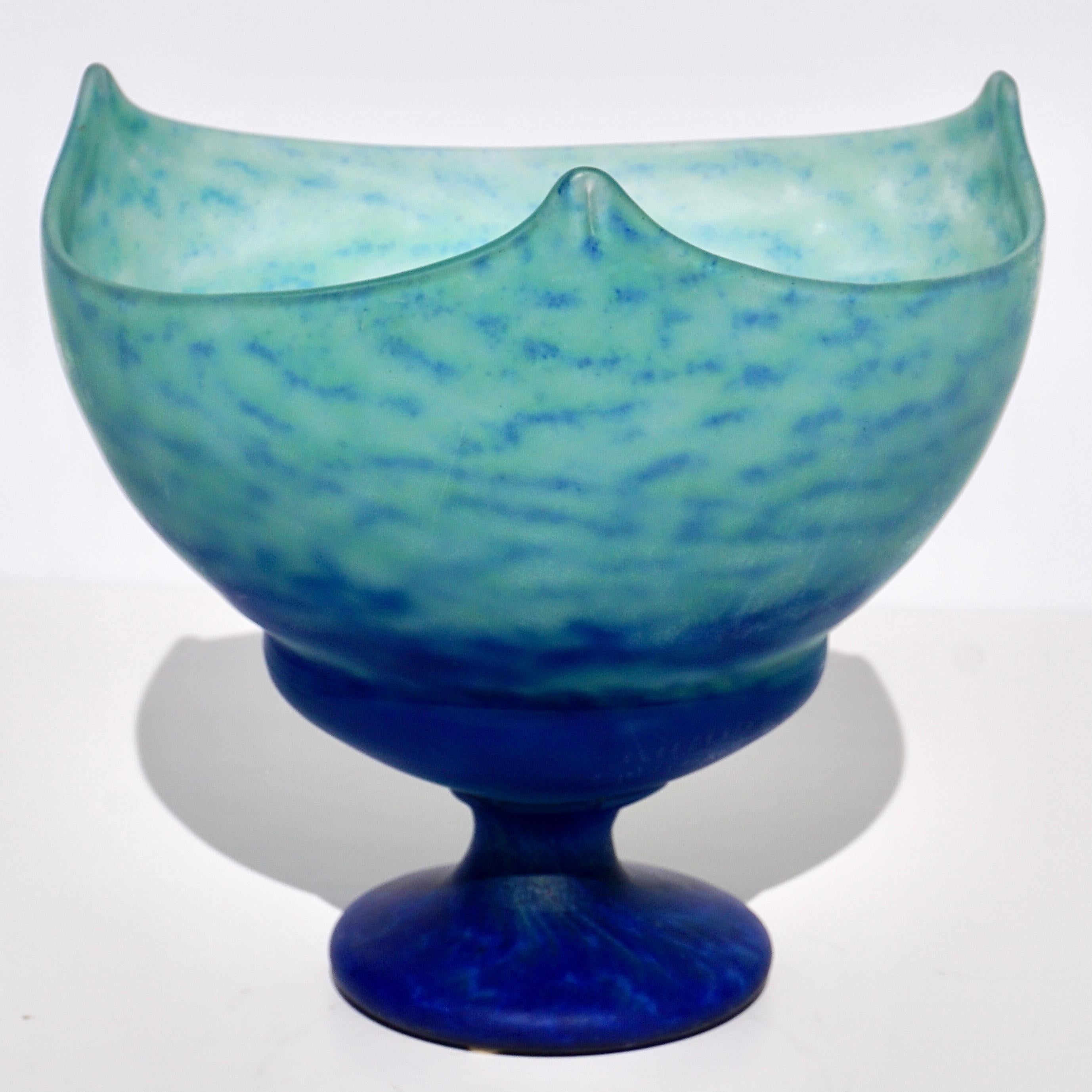 Daum Nancy Blue Variegated Coupe vase.

Everyone who glances towards this beautiful vase feels compelled to acknowledge it with accolades. A fabulous art nouveau art glass vase.
 
France circa 1910 - Glass Art nouveau fruit bowl in glass paste