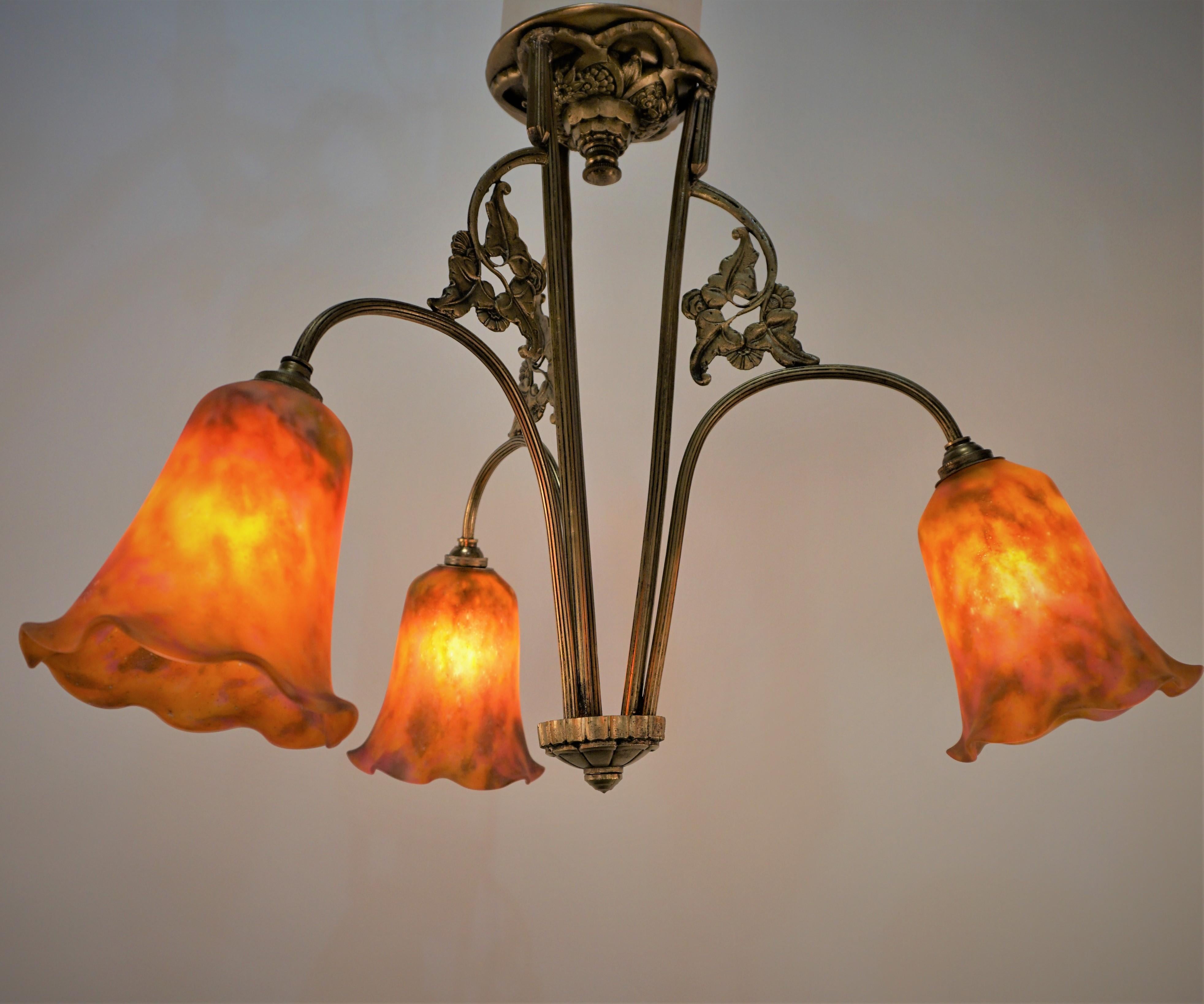 Beautiful, signed orange flame color blow glass shades with elegant bronze frame chandelier.
 Professionally rewired and ready for installation.