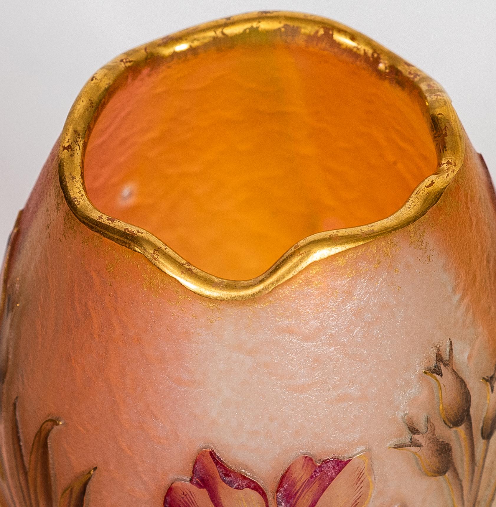 Daum Nancy Cameo and enamel glass vase,
France, circa 1910
decorated with red and pink flowers on a light opalescent ground
signed in gilt Daum Nancy with Lorraine cross
Dimensions:
Height 3 1/2 in. (8.89 cm.)
Diameter 2 1/4 in. (5.71 cm.)