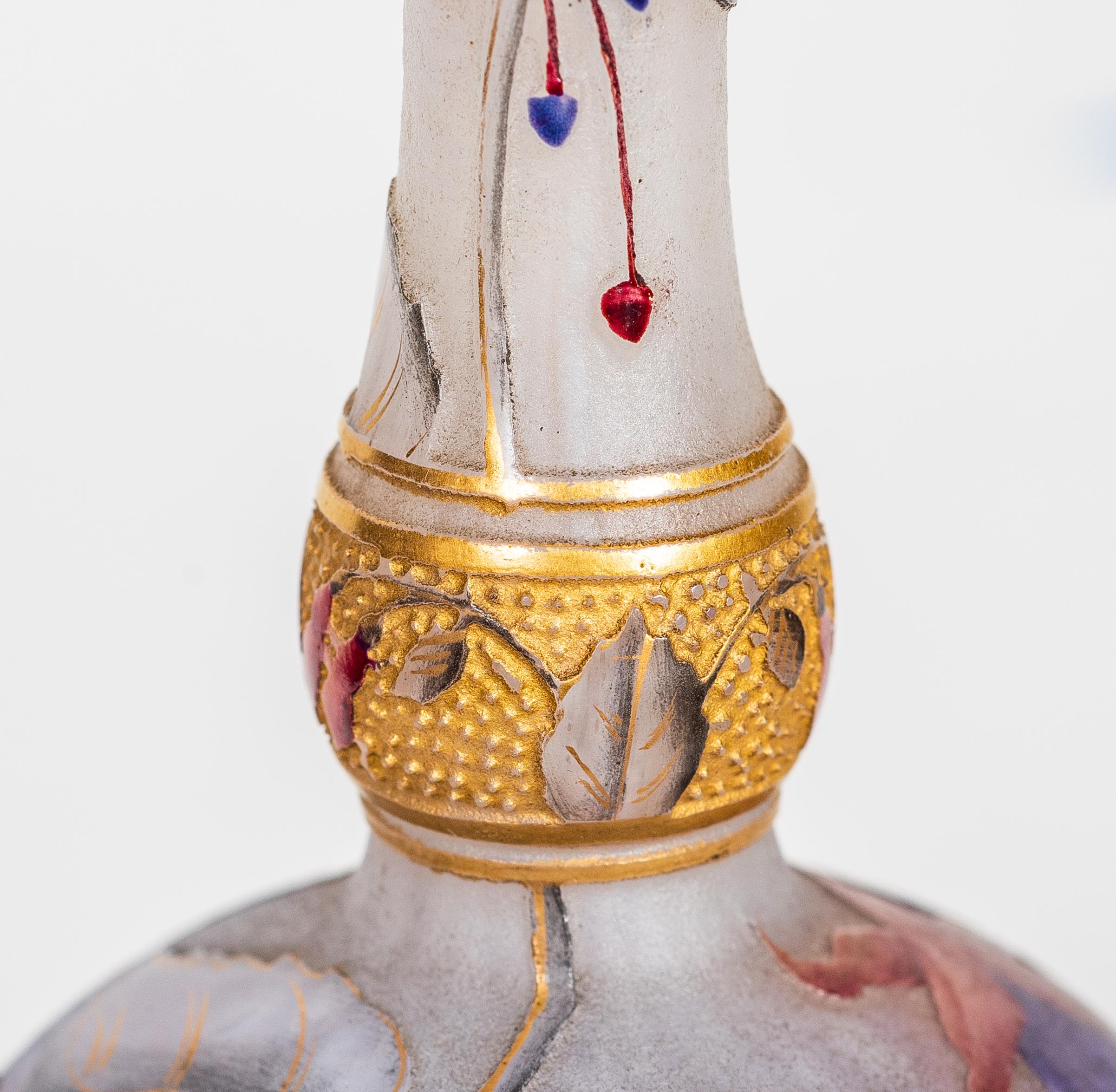 Daum Nancy Cameo and enamel glass vase,
France, circa 1900
decorated with gilt, red and purple flowers on an opalescent and purple ground
signed Daum Nancy with Cross of Lorraine
Dimensions
Height
5.59 in. (14.2 cm).