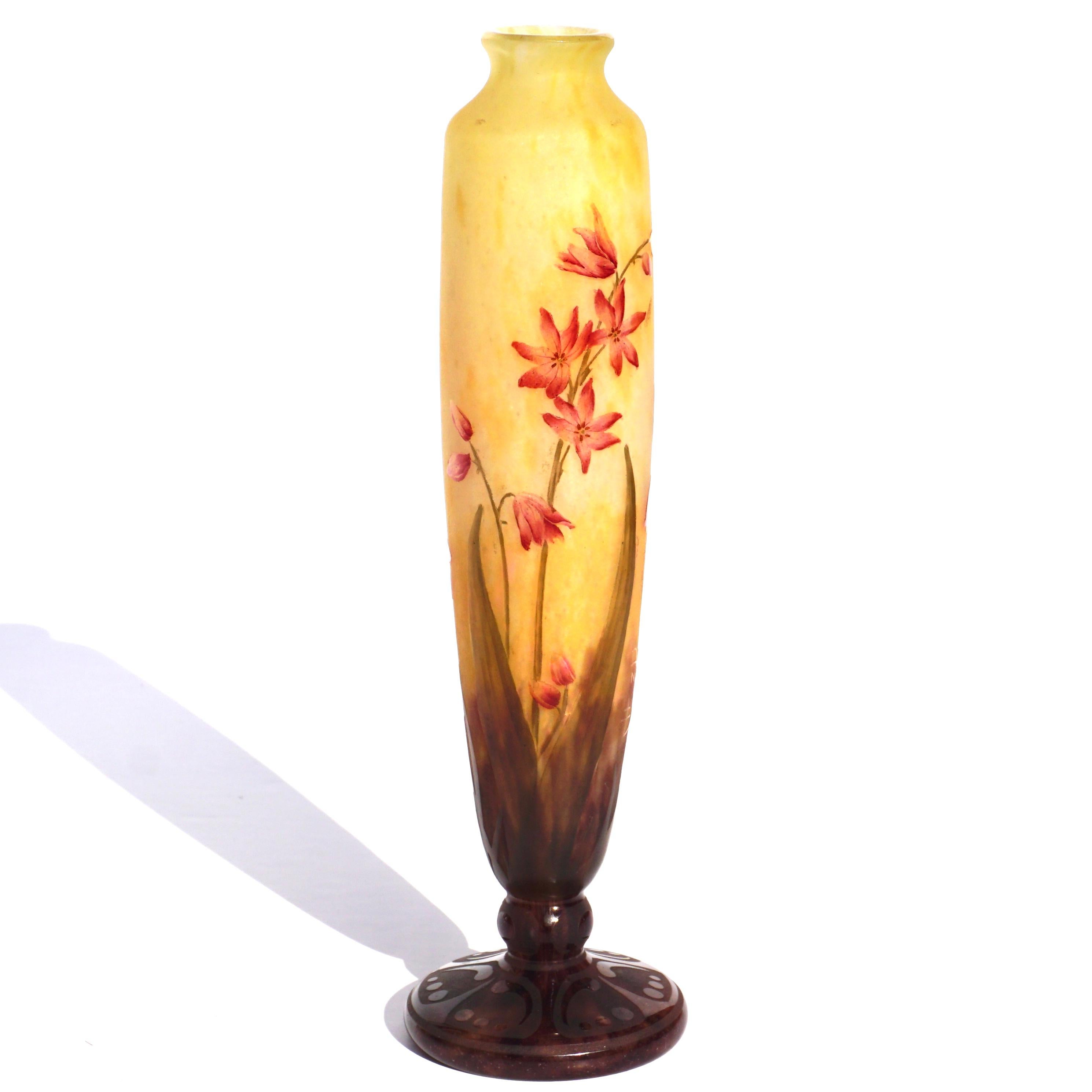 DAUM NANCY Cameo and Enameled Art Nouveau Glass vase
circa 1900
Enameled and acid etched with mottled glass.
Signed: 'Daum Nancy' with the Cross of Lorraine
Height: 9.3 Inches (23.5cm)

Condition: Very Good condition and appearance with no